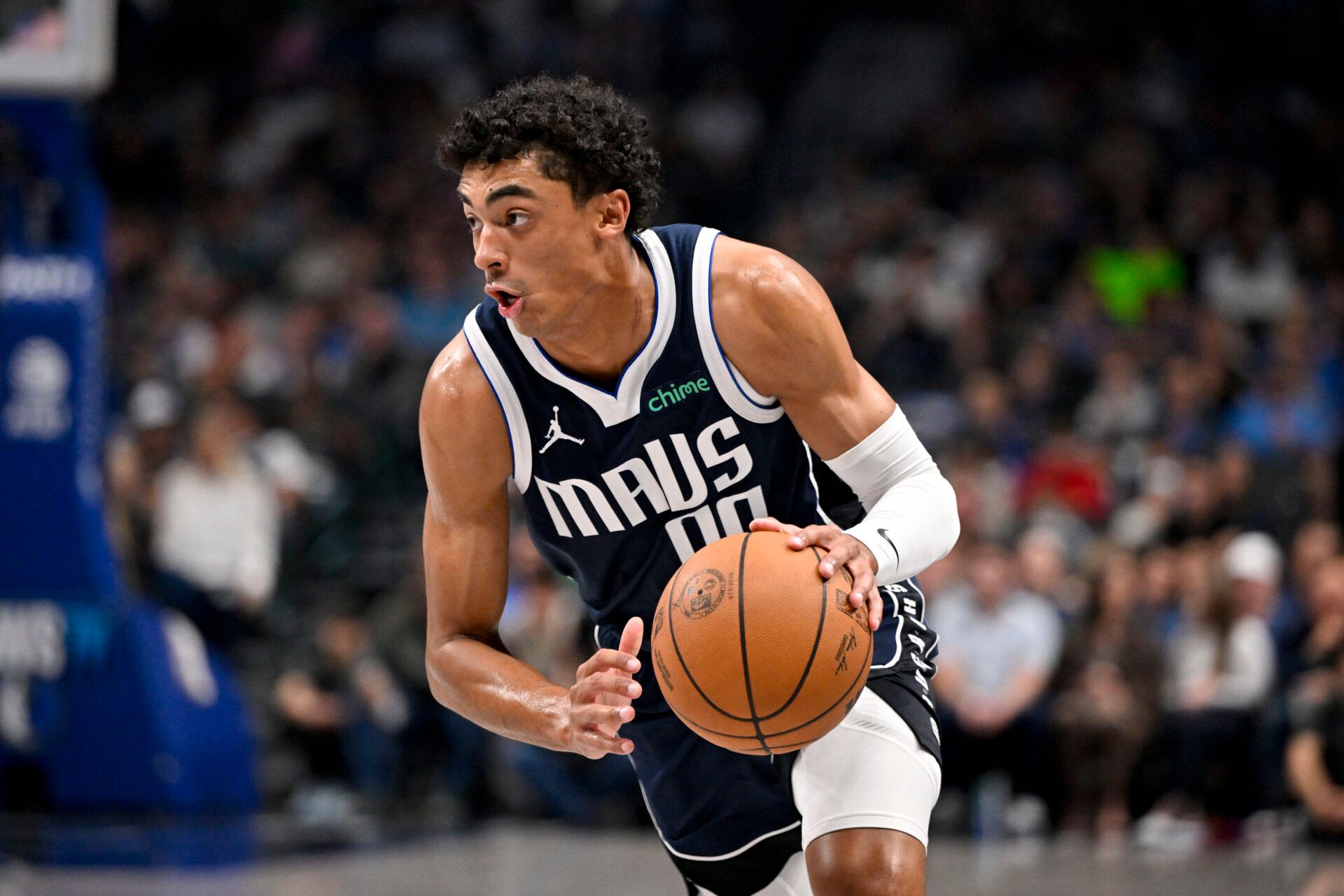 Dallas Mavericks guard Max Christie (00) drives to the basket against the Memphis Grizzlies during the first quarter at the American Airlines Center.