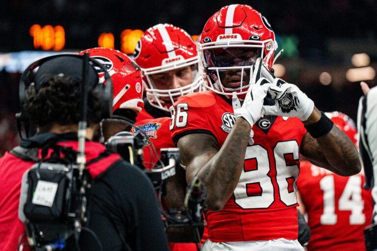 Georgia wide receiver Dillon Bell (86) celebrates after wide receiver Zachariah Branch (1) scored a touchdown during the Sugar Bowl and College Football Playoff quarterfinals at Caesars Superdome in New Orleans, La., on Thursday, Jan. 1, 2026. Ole Miss defeated Georgia 39-34.