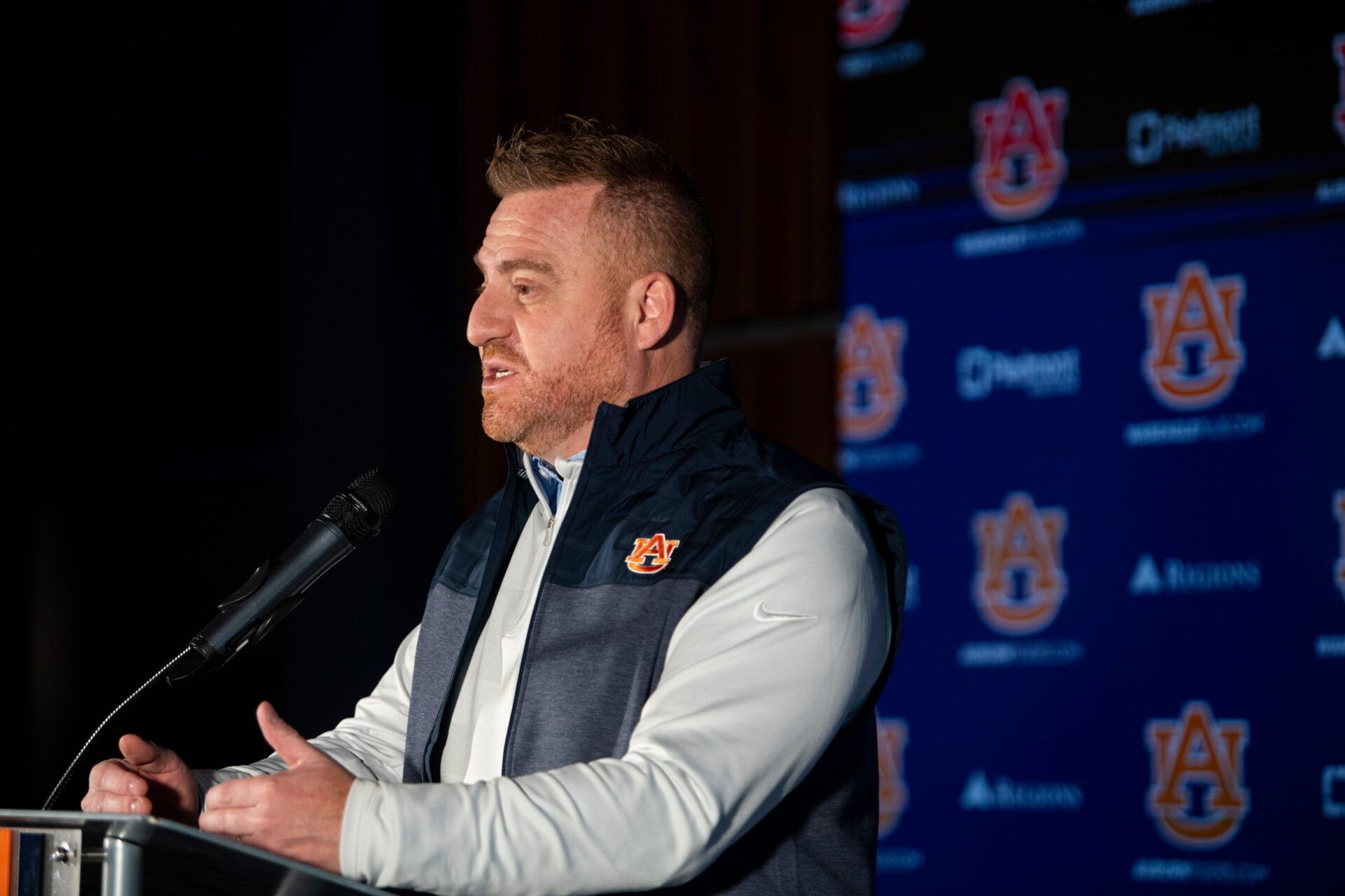 Auburn Tigers football head coach Alex Golesh speaks during a press conference at Woltosz Performance Center in Auburn, Ala. on Monday, Dec. 8, 2025.