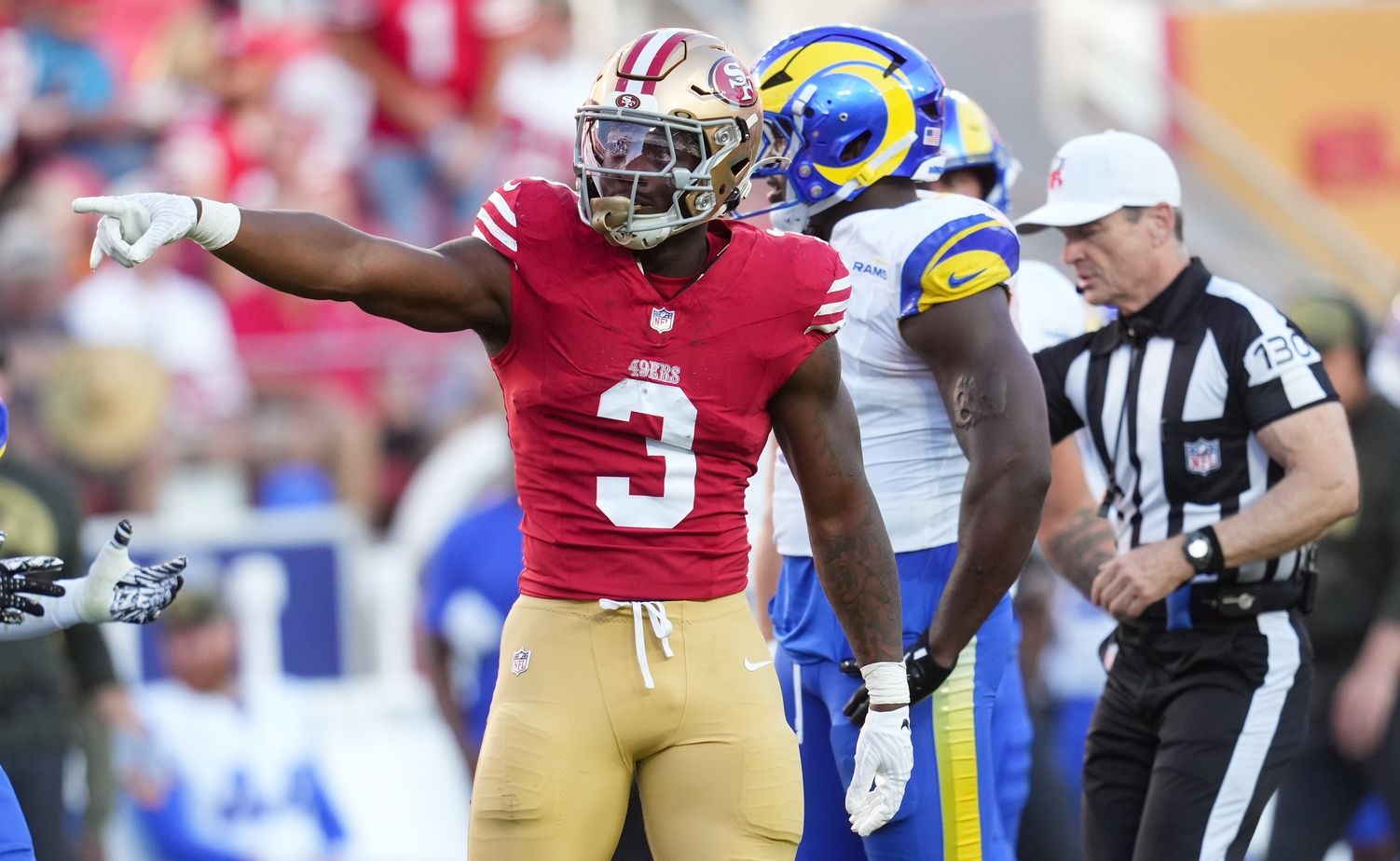 San Francisco 49ers running back Brian Robinson Jr. (3) celebrates after a play during the third quarter against the Los Angeles Rams at Levi's Stadium.