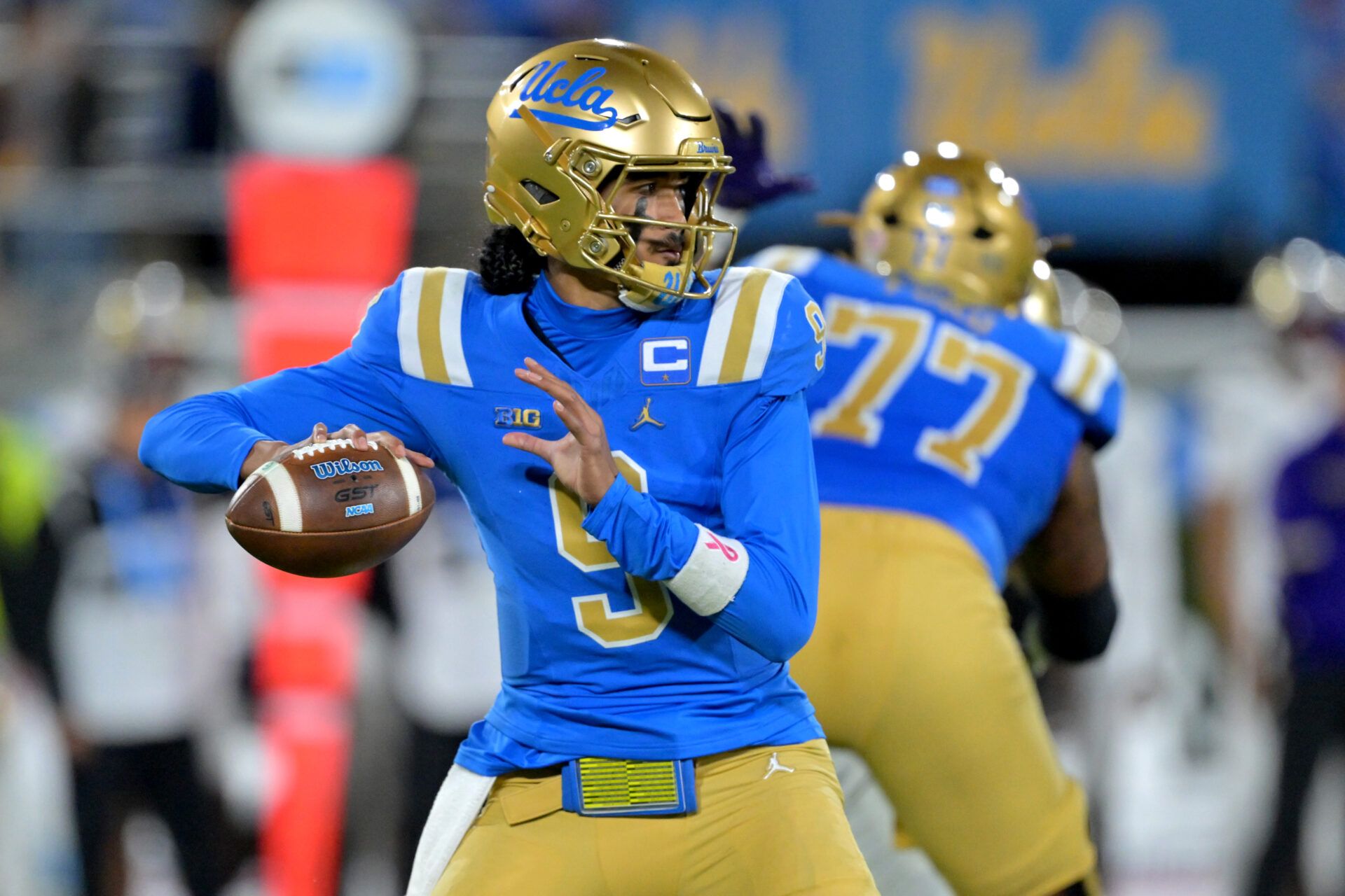 UCLA Bruins quarterback Nico Iamaleava (9) sets to pass the ball during the first half against the Washington Huskies at the Rose Bowl.