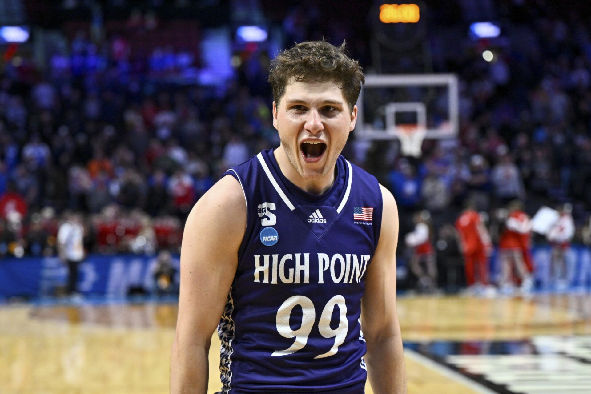 High Point Panthers guard Chase Johnston (99) reacts after defeating the Wisconsin Badgers in a first round game of the men's 2026 NCAA Tournament at Moda Center.