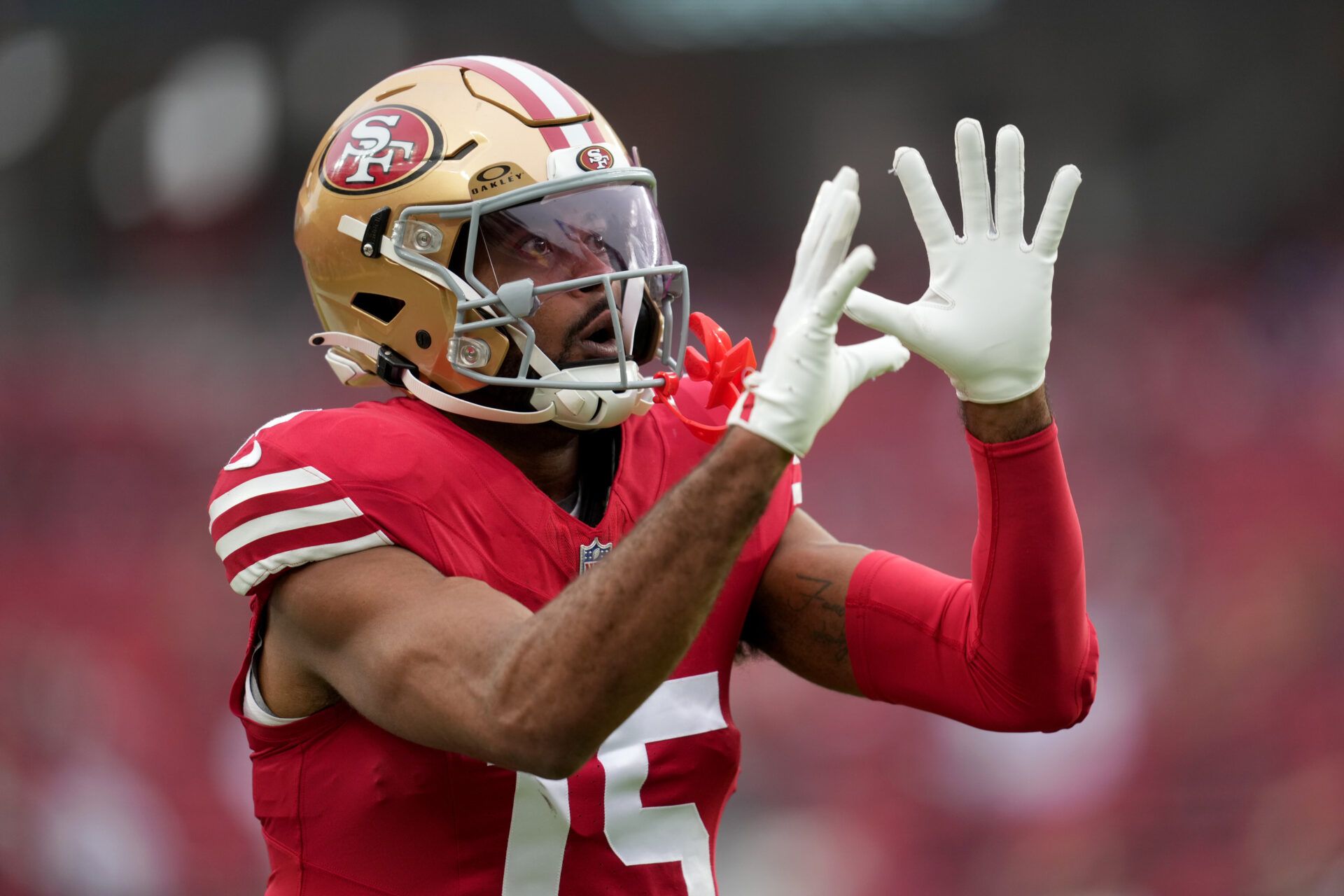San Francisco 49ers wide receiver Jauan Jennings (15) warms up prior to the first half against the Tennessee Titans at Levi's Stadium.