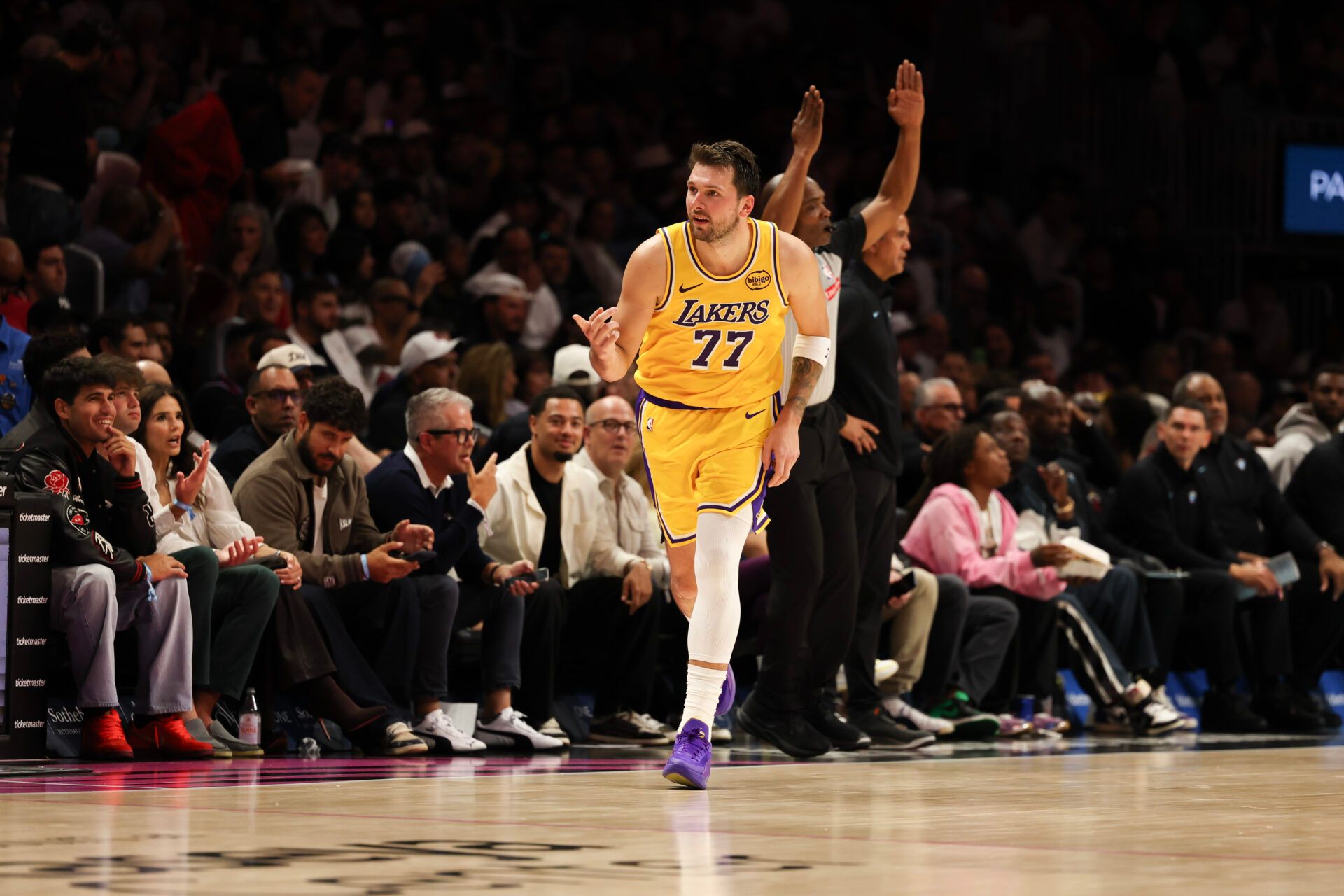 Los Angeles Lakers guard Luka Doncic (77) reacts against the Miami Heat during the second half at Kaseya Center.