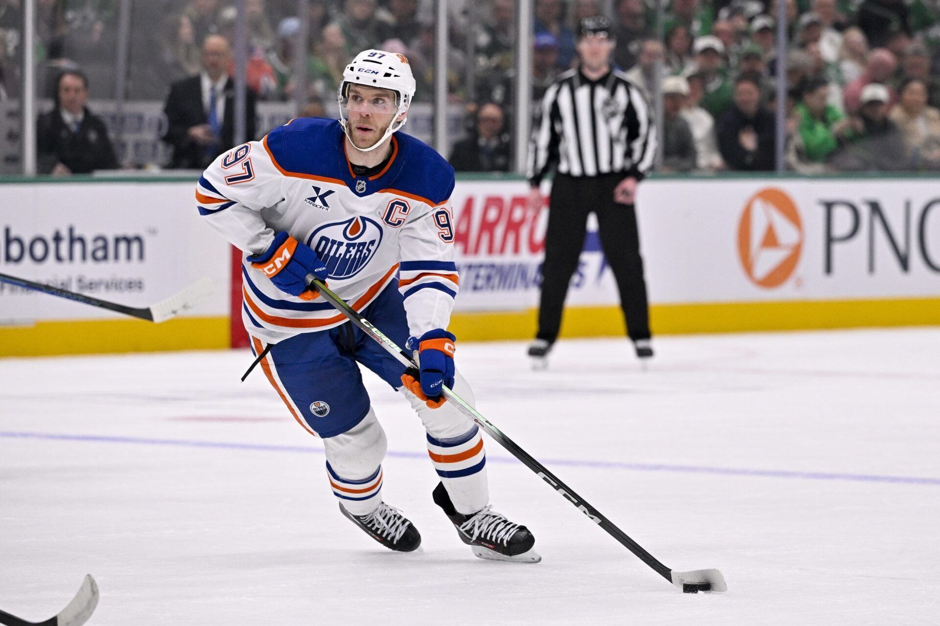 Edmonton Oilers center Connor McDavid (97) skates against the Dallas Stars during the game between the Stars and the Oilers at the American Airlines Center.