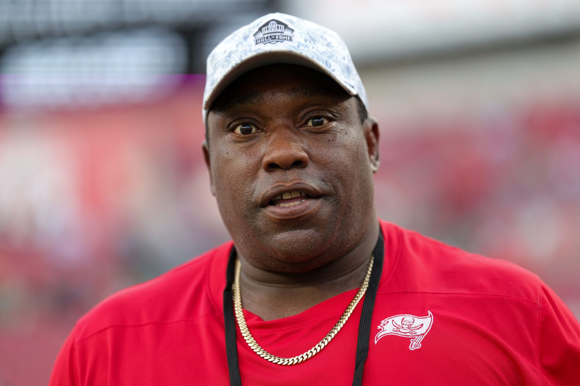 former Tampa Bay Buccaneers Warren Sapp looks on from the sidelines before a game against the Philadelphia Eagles at Raymond James Stadium.