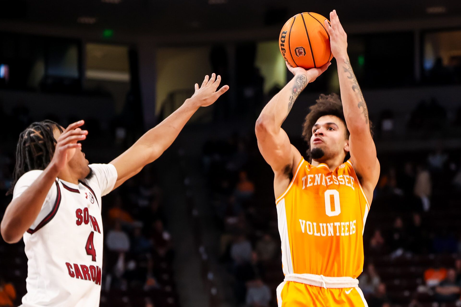 Tennessee Volunteers guard Ja'kobi Gillespie (0) shoots over South Carolina Gamecocks guard Kobe Knox (4) in the second half at Colonial Life Arena.