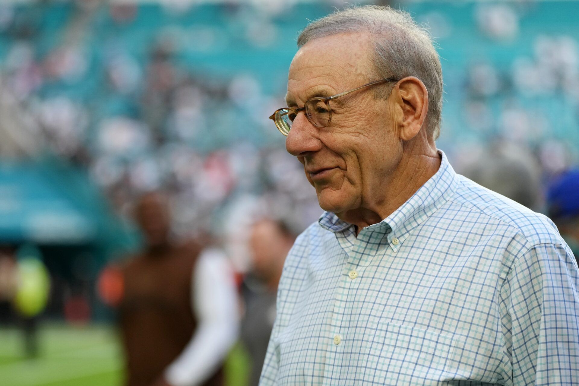 Miami Dolphins owner Stephen M. Ross walks off the field after his Miami Dolphins team defeated the Las Vegas Raiders at Hard Rock Stadium.