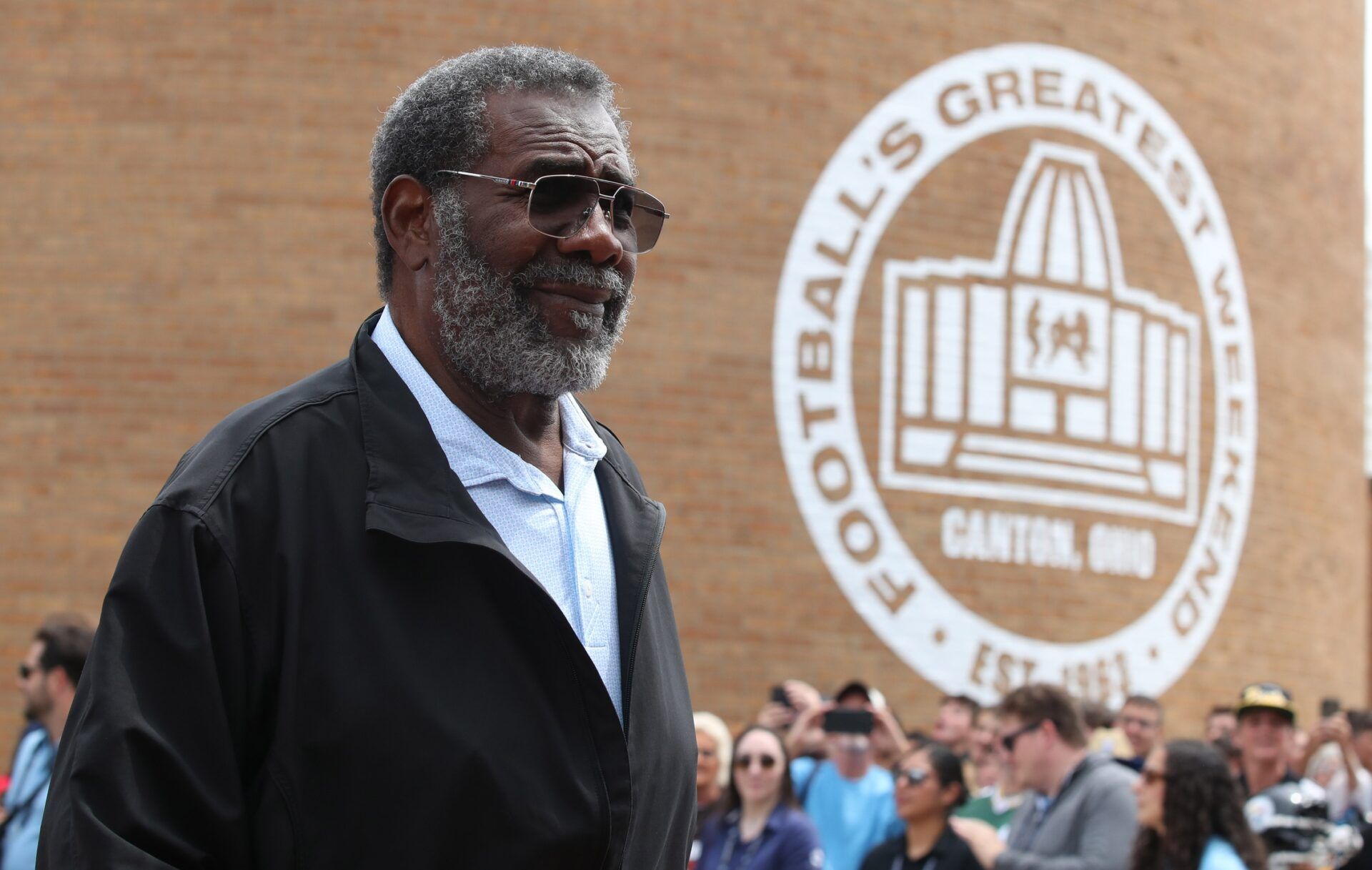 Hall of Fame member Joe Greene enters the ceremonies at the Pro Football Hall of Fame-Class of 2025 enshrinement ceremonies  at Tom Benson Hall of Fame Stadium.