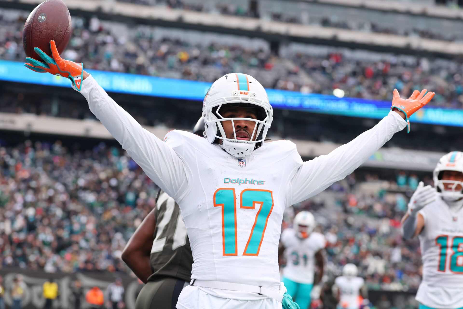 Miami Dolphins wide receiver Jaylen Waddle (17) reacts after making a catch for a touchdown against the New York Jets during the first half at MetLife Stadium.