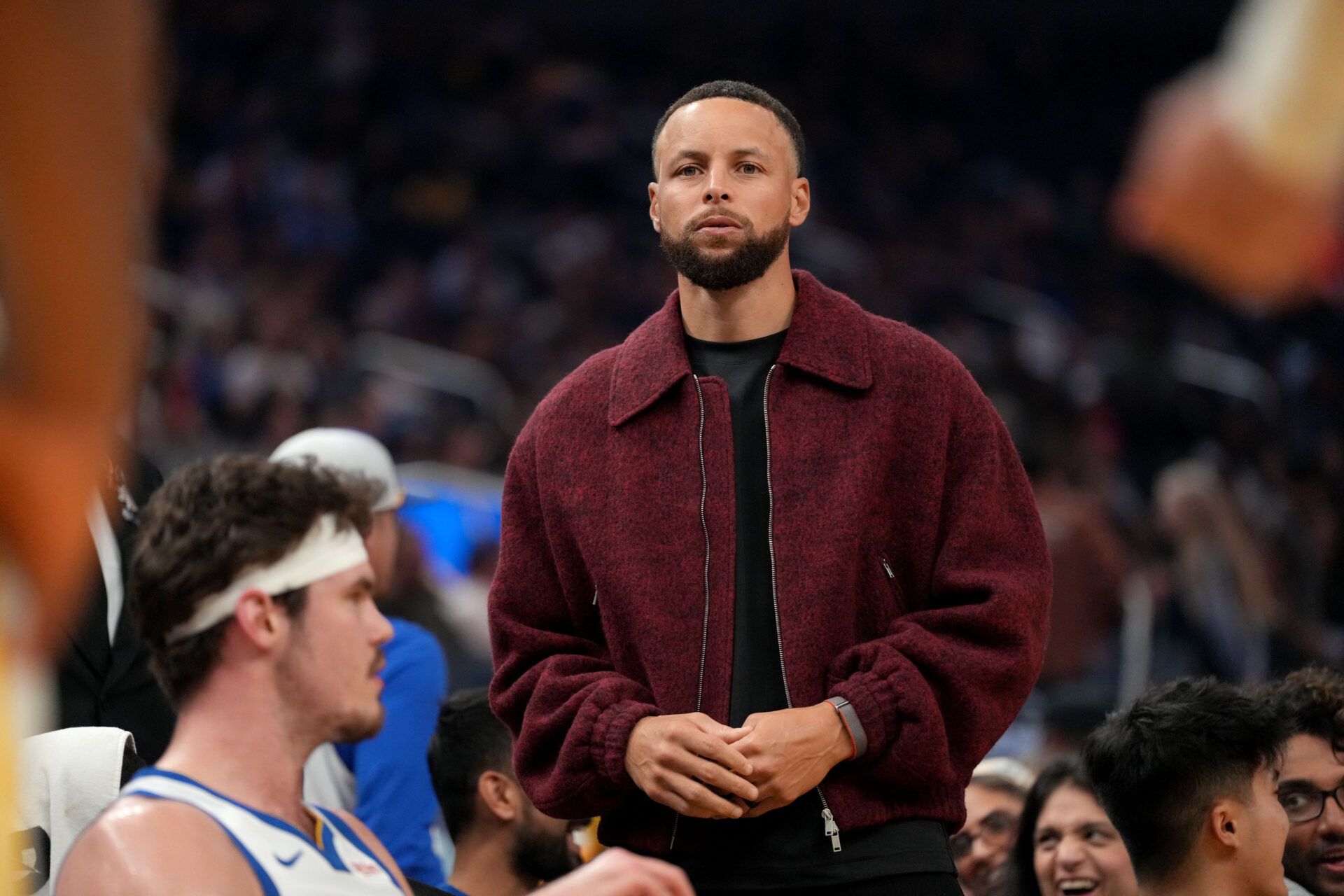 Golden State Warriors guard Stephen Curry (30) stands near the team bench during a timeout against the Minnesota Timberwolves in the first quarter at the Chase Center.