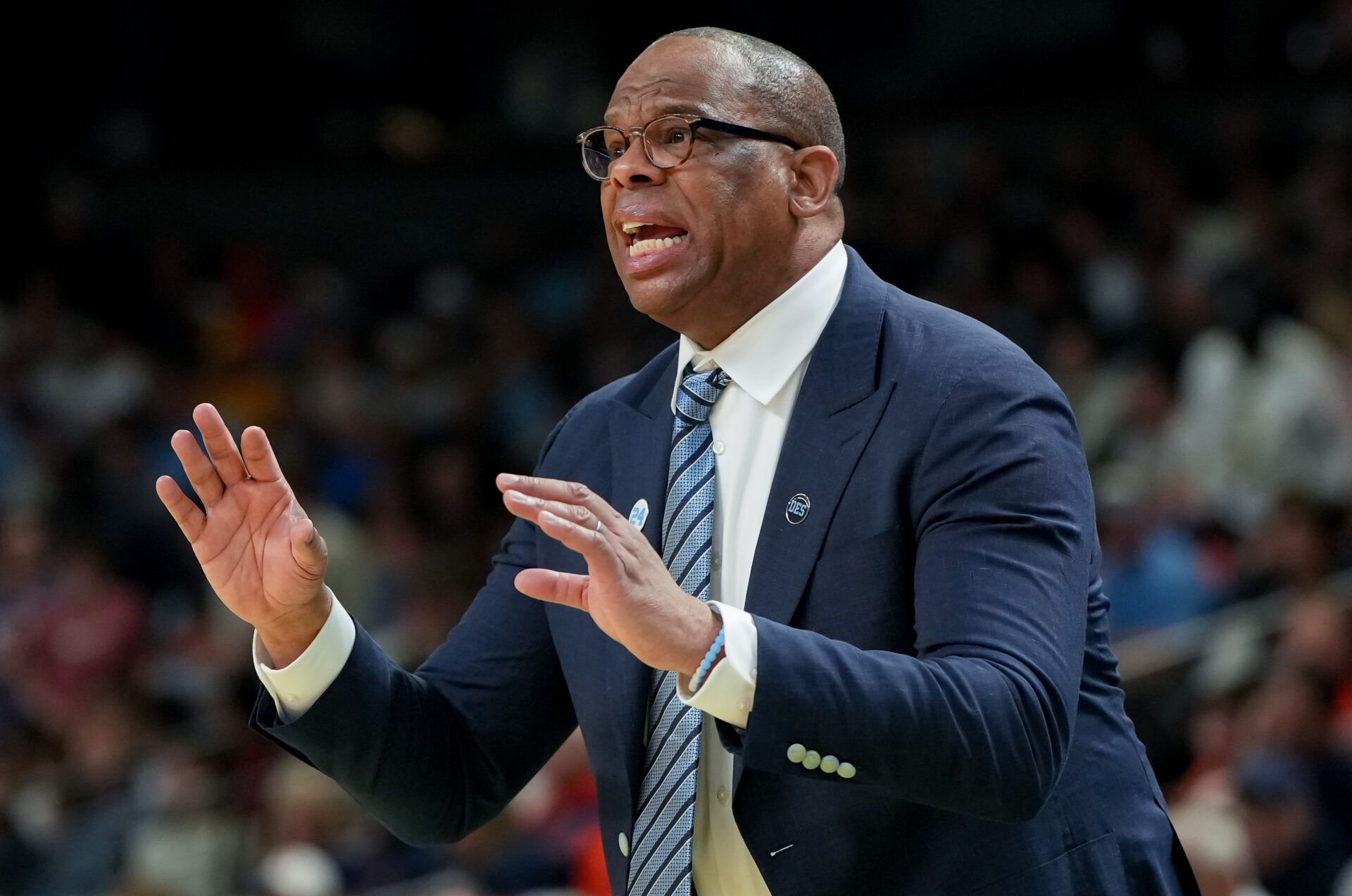 North Carolina Tar Heels head coach Hubert Davis instructs his team against the VCU Rams in the second half of a first round game of the men's 2026 NCAA Tournament at Bon Secours Wellness Arena.