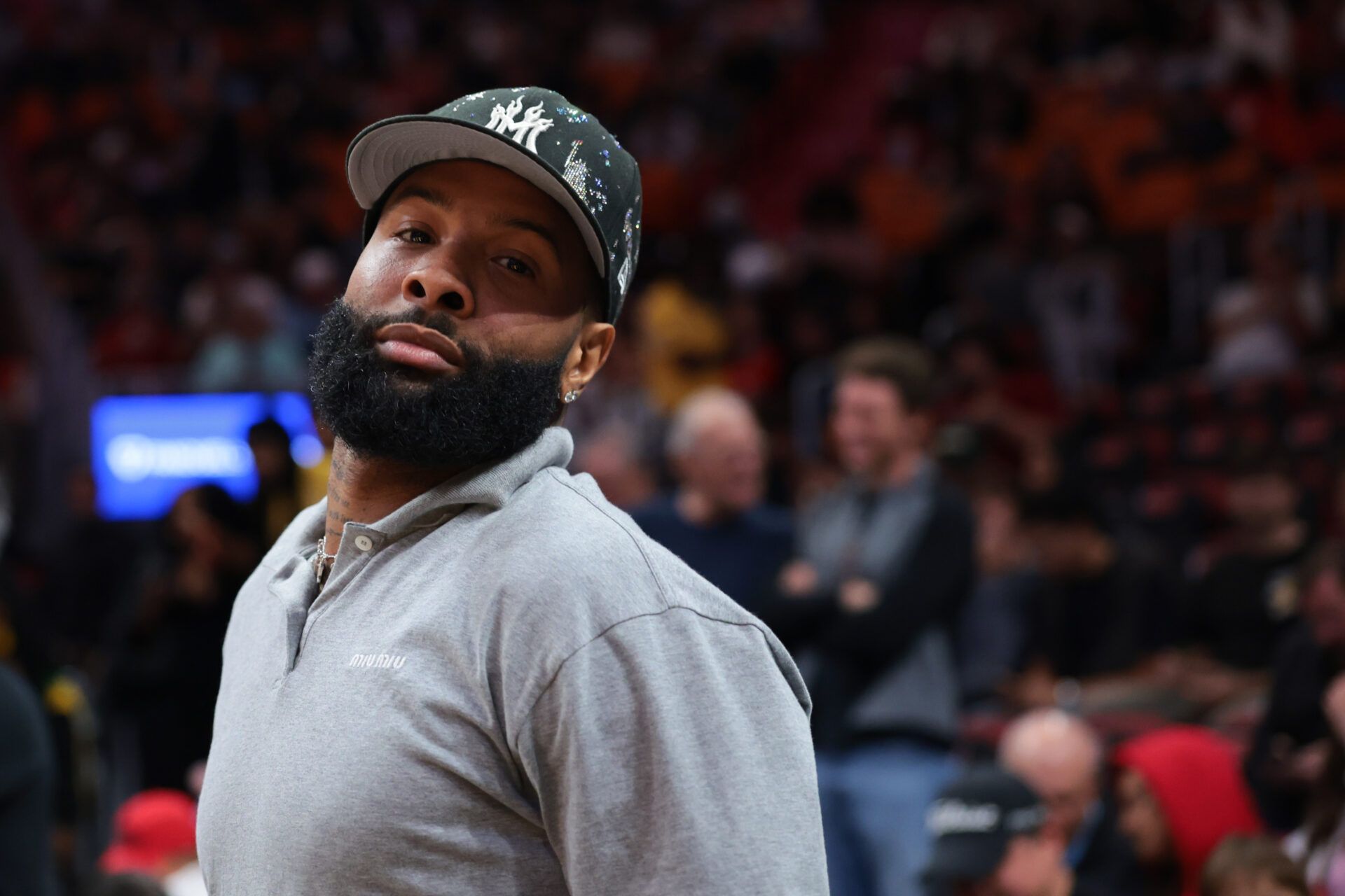 Football wide receiver Odell Beckham Jr. attends the game between the Miami Heat and the Phoenix Suns at Kaseya Center.