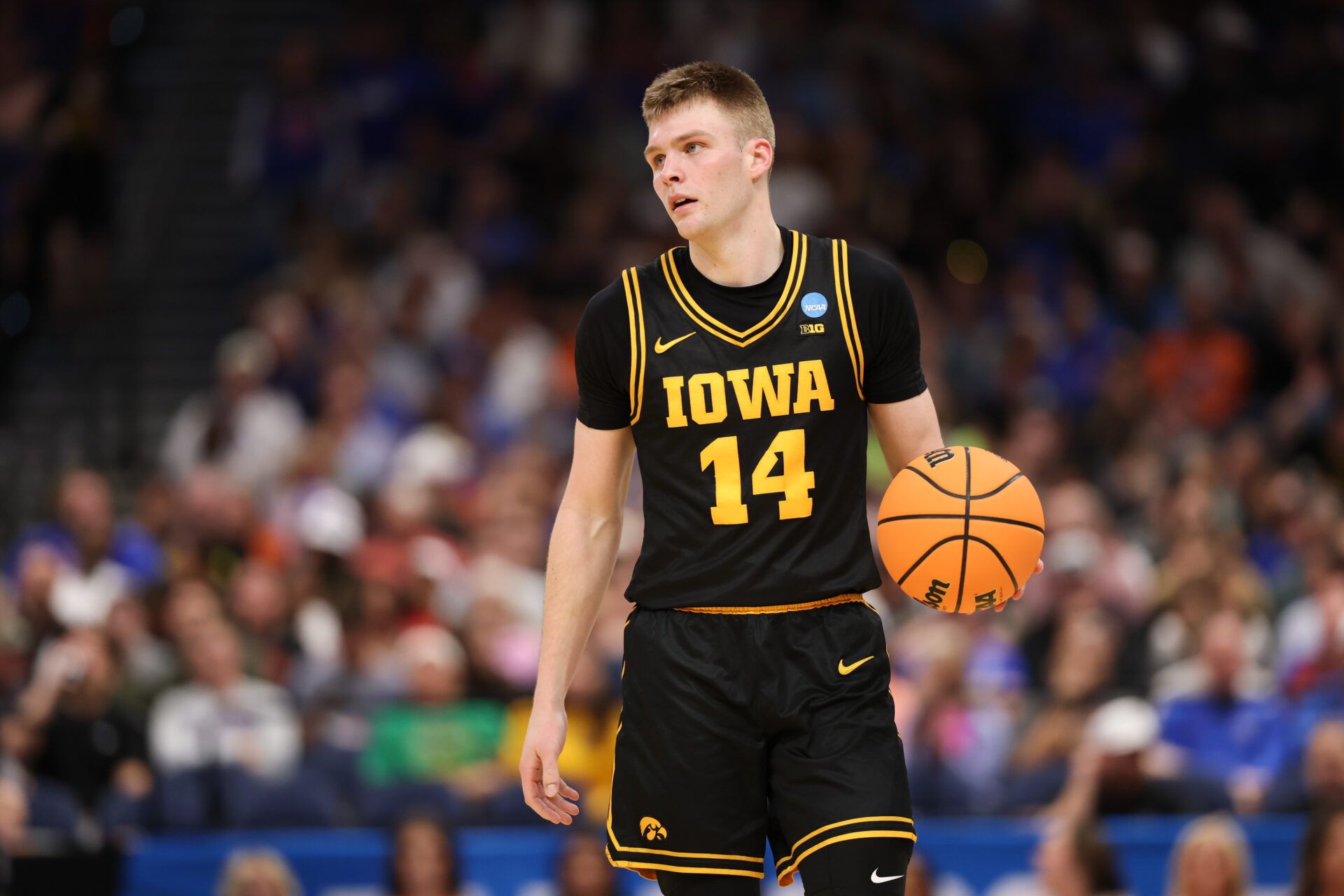 Iowa Hawkeyes guard Bennett Stirtz (14) looks on during the second half against the Clemson Tigers during a first round game of the men's 2026 NCAA Tournament at Benchmark International Arena.