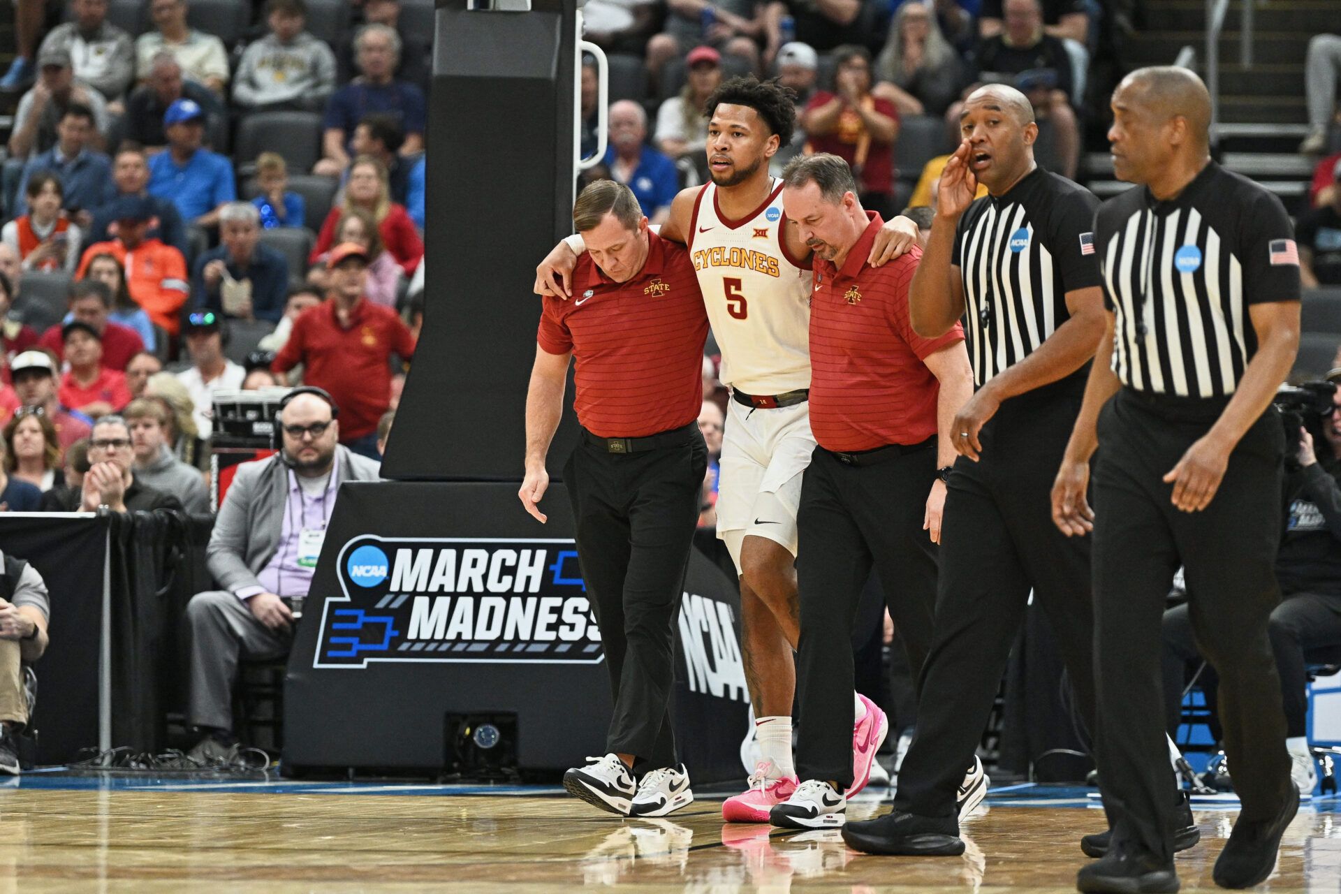 Iowa State Cyclones forward Joshua Jefferson (5) is helped off of the court after suffering an apparent injury to his left leg while shooting a layup against Tennessee State Tigers forward Jalen Pitre (not pictured) during the first half of a first round game of the men's 2026 NCAA Tournament at Enterprise Center.