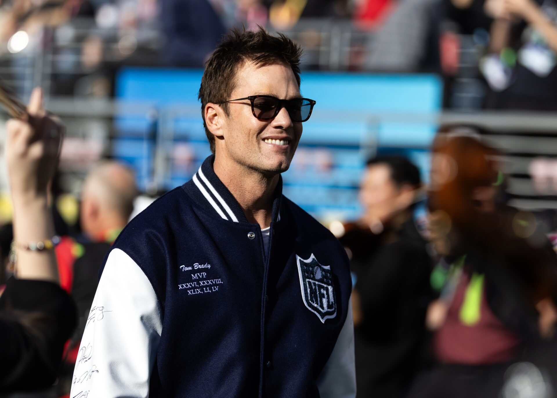 Former Super Bowl MVP Tom Brady in attendance before Super Bowl LX between the Seattle Seahawks and the New England Patriots at Levi's Stadium.