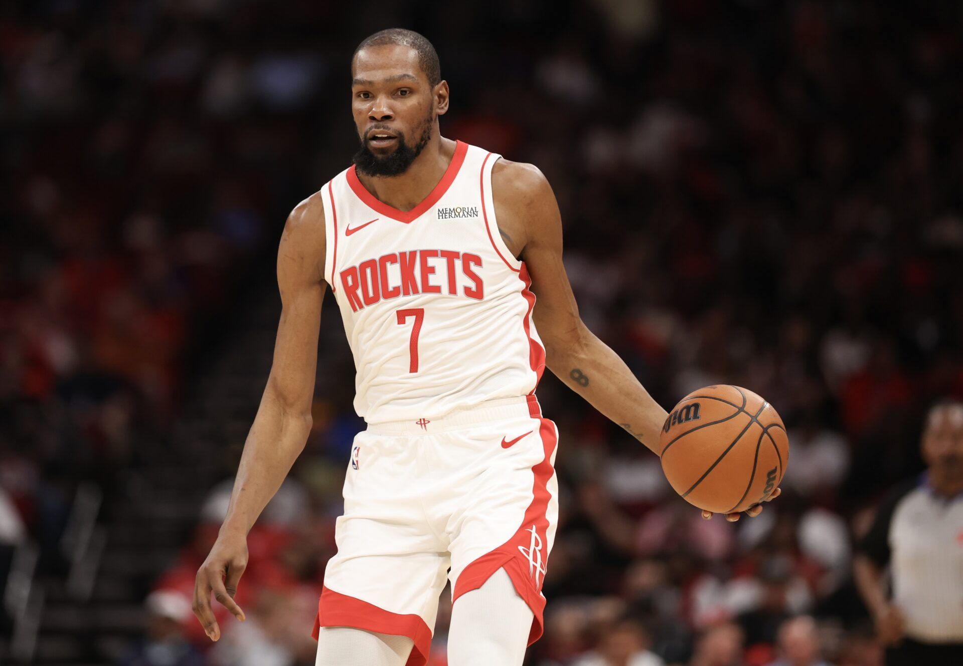 Houston Rockets forward Kevin Durant (7) dribbles against the Miami Heat  in the first half at Toyota Center.