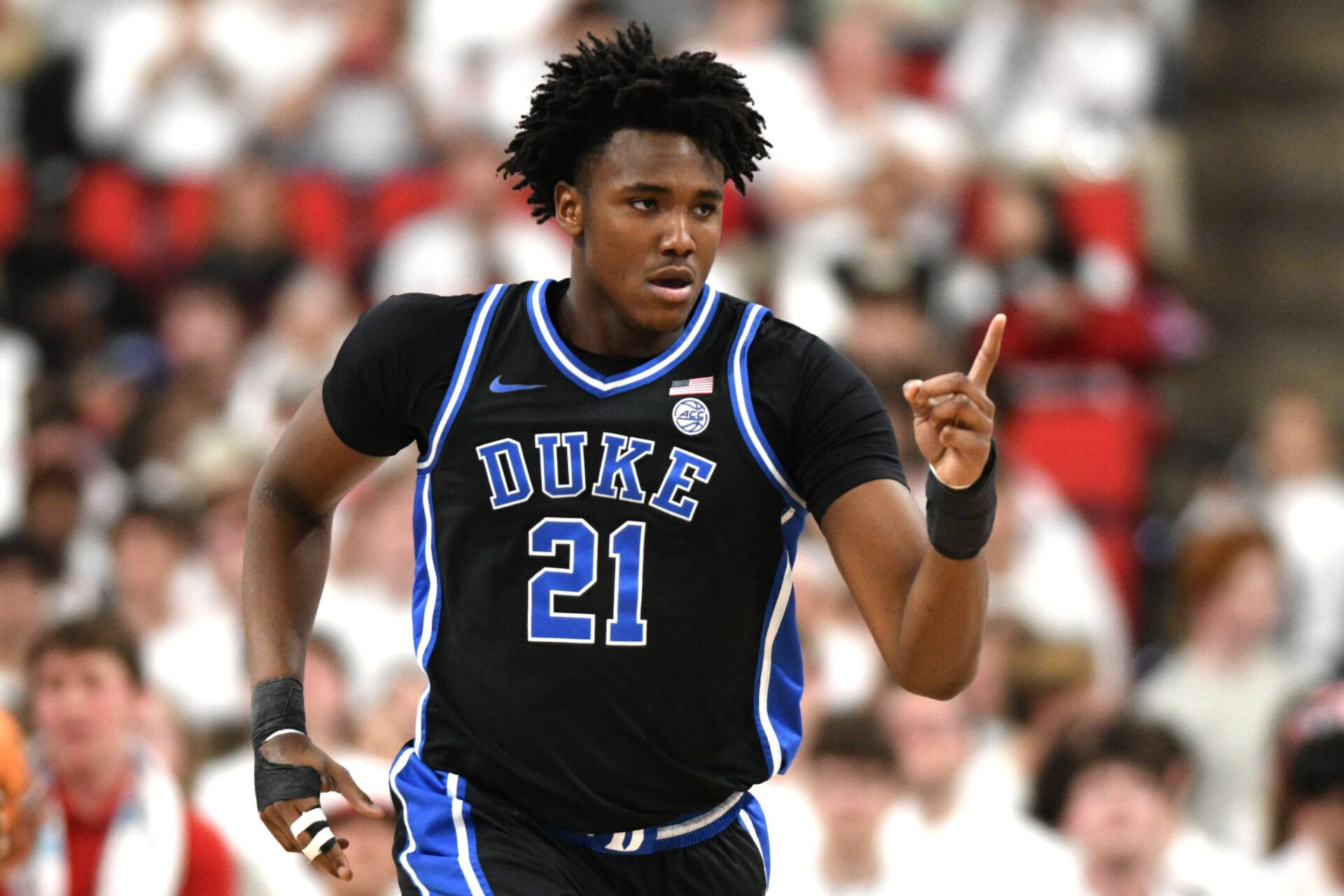 Duke Blue Devils center Patrick Ngongba II (21) reacts after scoring against the NC State Wolfpack during the first half at Lenovo Center.