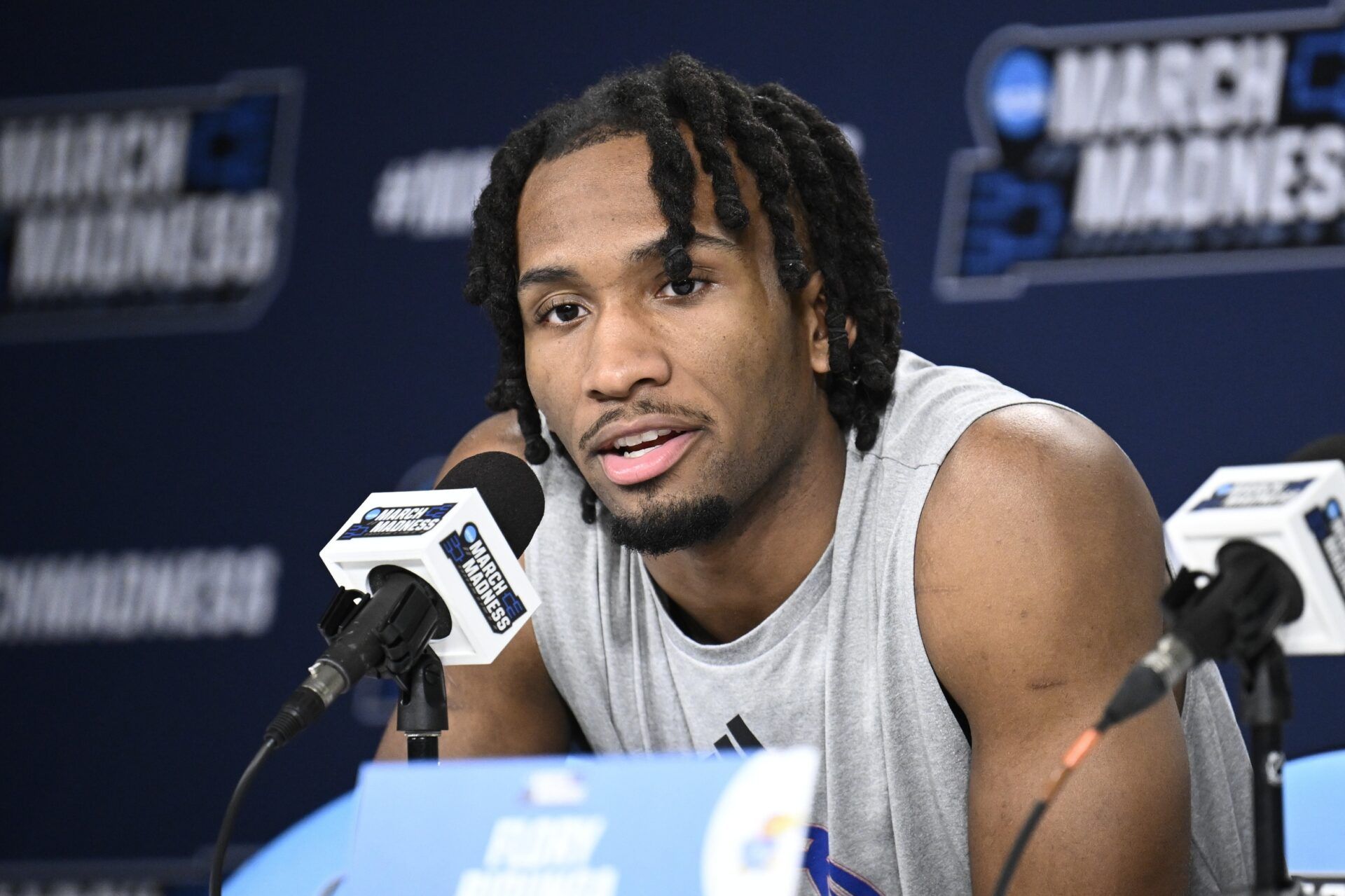 Kansas Jayhawks guard Darryn Peterson (22) speaks at a news conference ahead of the first round of the men's 2026 NCAA Tournament at Viejas Arena.