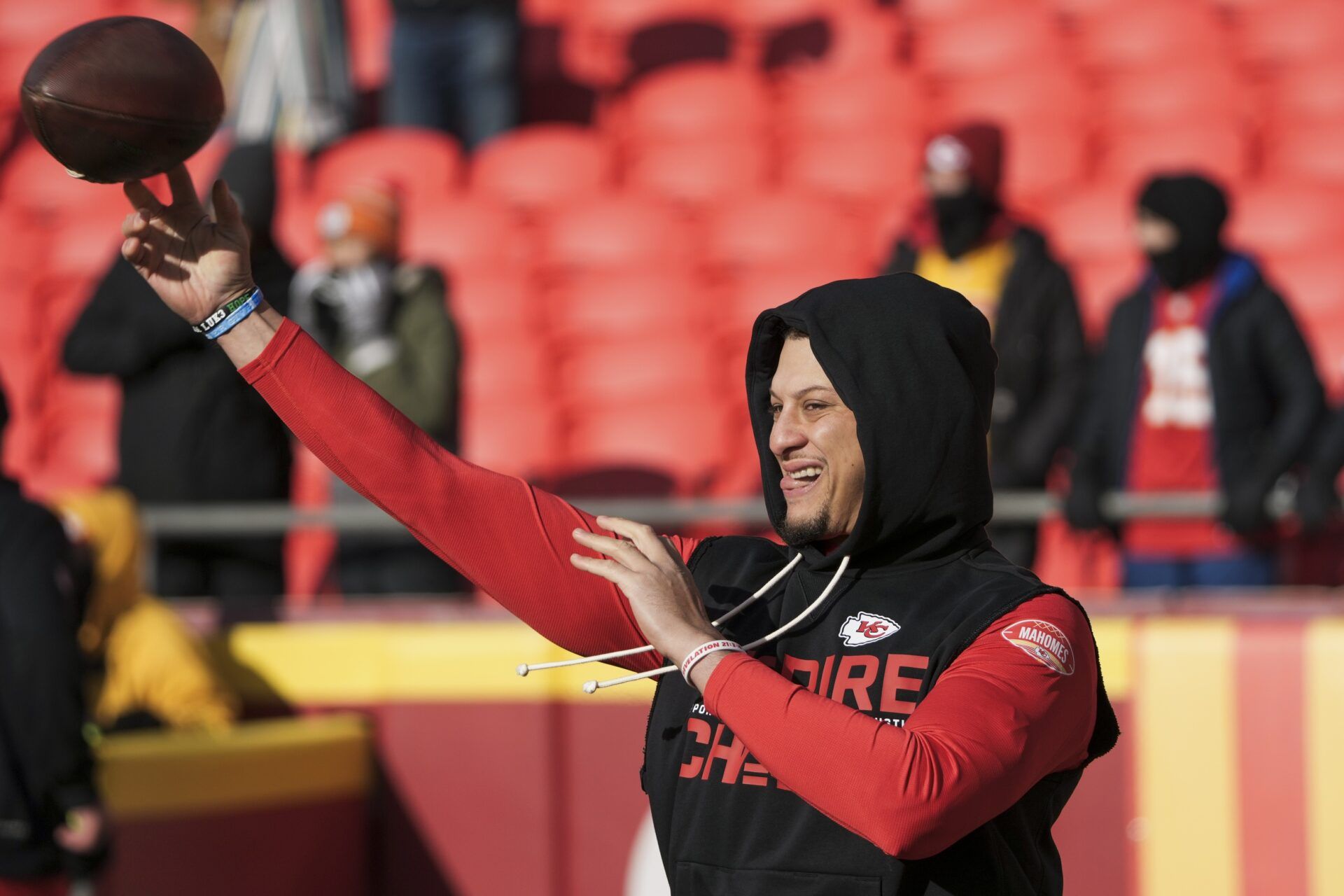 Kansas City Chiefs quarterback Patrick Mahomes (15) throws during early pregame warmups against the Los Angeles Chargers at GEHA Field at Arrowhead Stadium.