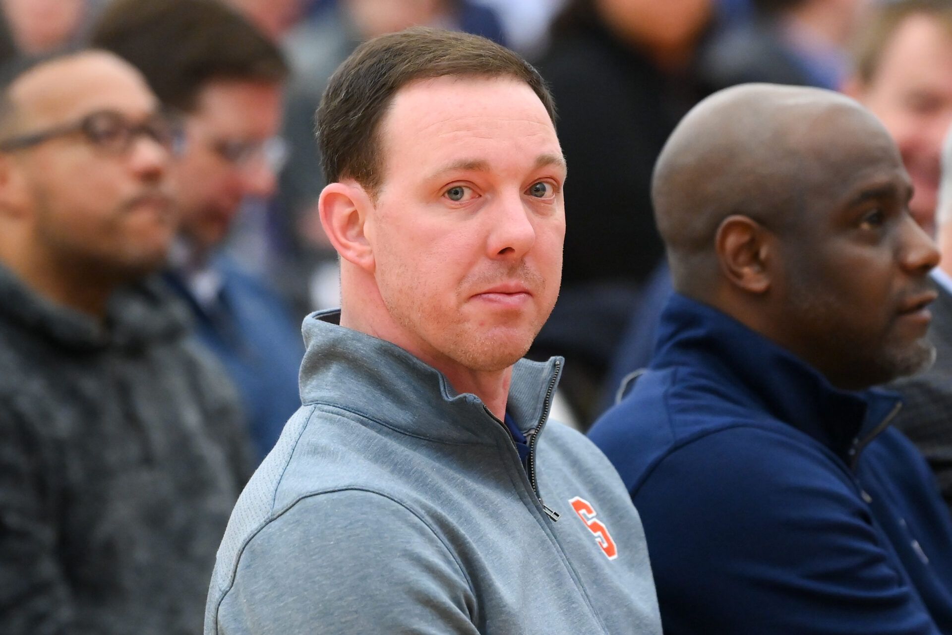 Syracuse Orange assistant coach Gerry McNamara (left) looks on prior to a press conference at the Carmelo K. Anthony Basketball Center.