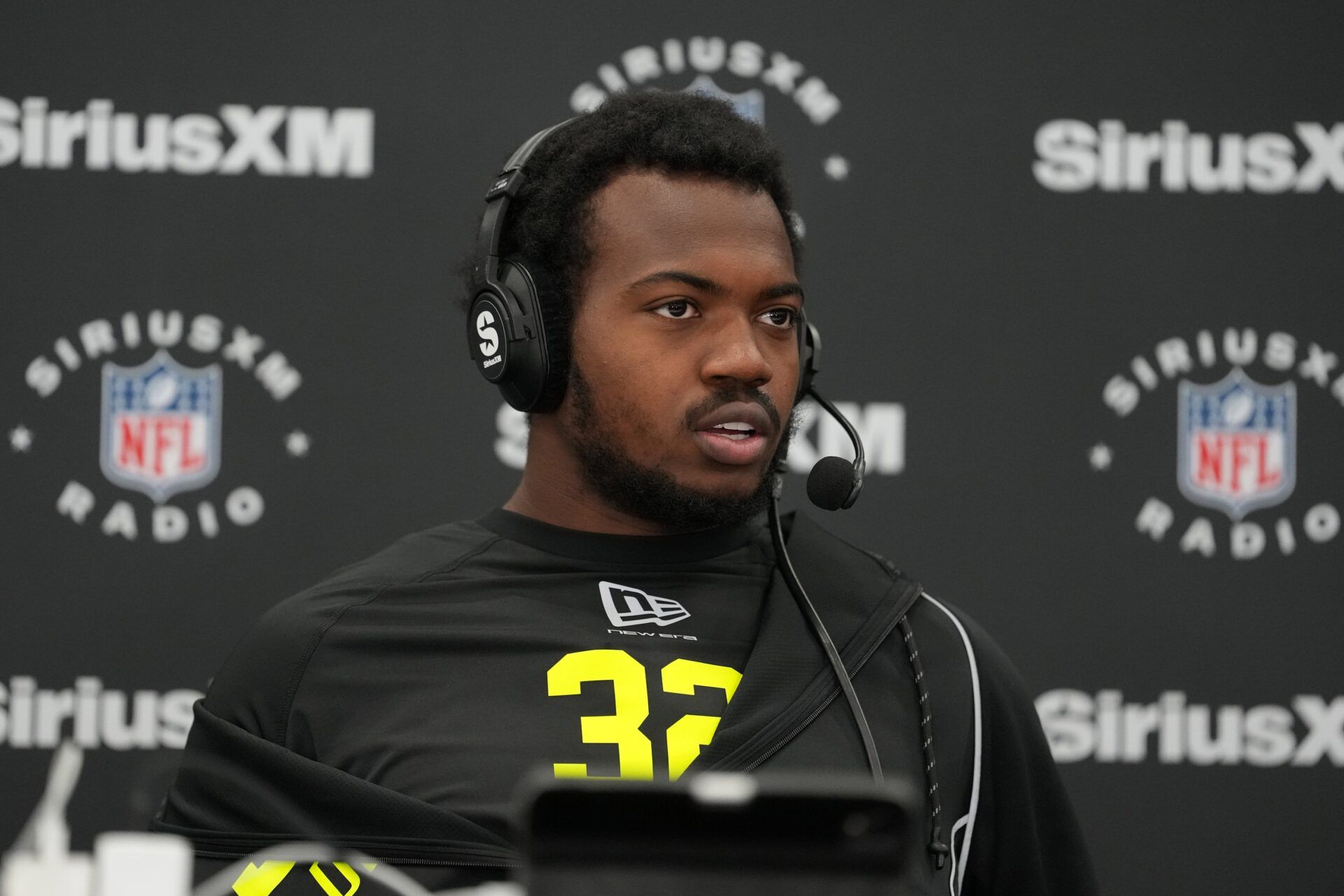 Miami defensive lineman Rueben Bain Jr. (DL32) on the SiriusXM NFL Radio set during the NFL Scouting Combine at the Indiana Convention Center.
