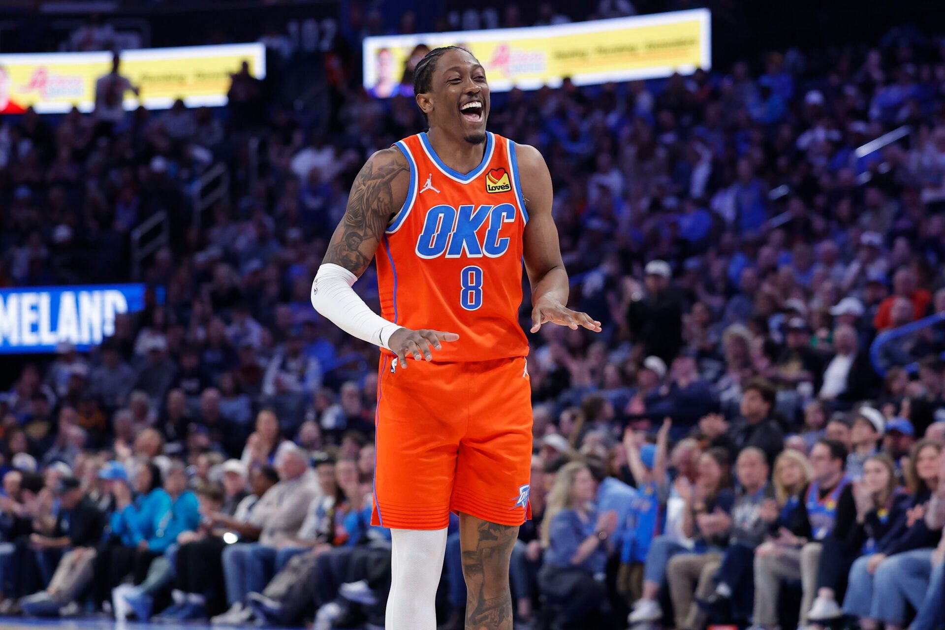 Oklahoma City Thunder guard/forward Jalen Williams (8) laughs after a play against the Miami Heat during the second half at Paycom Center.