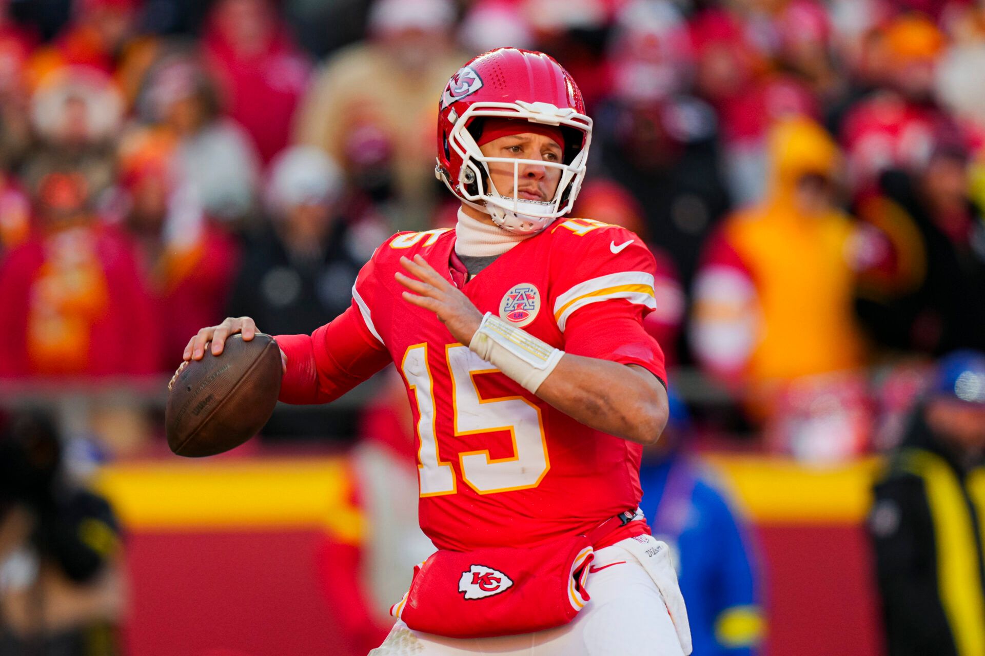 Kansas City Chiefs quarterback Patrick Mahomes (15) throws a pass during the second half against the Los Angeles Chargers at GEHA Field at Arrowhead Stadium.