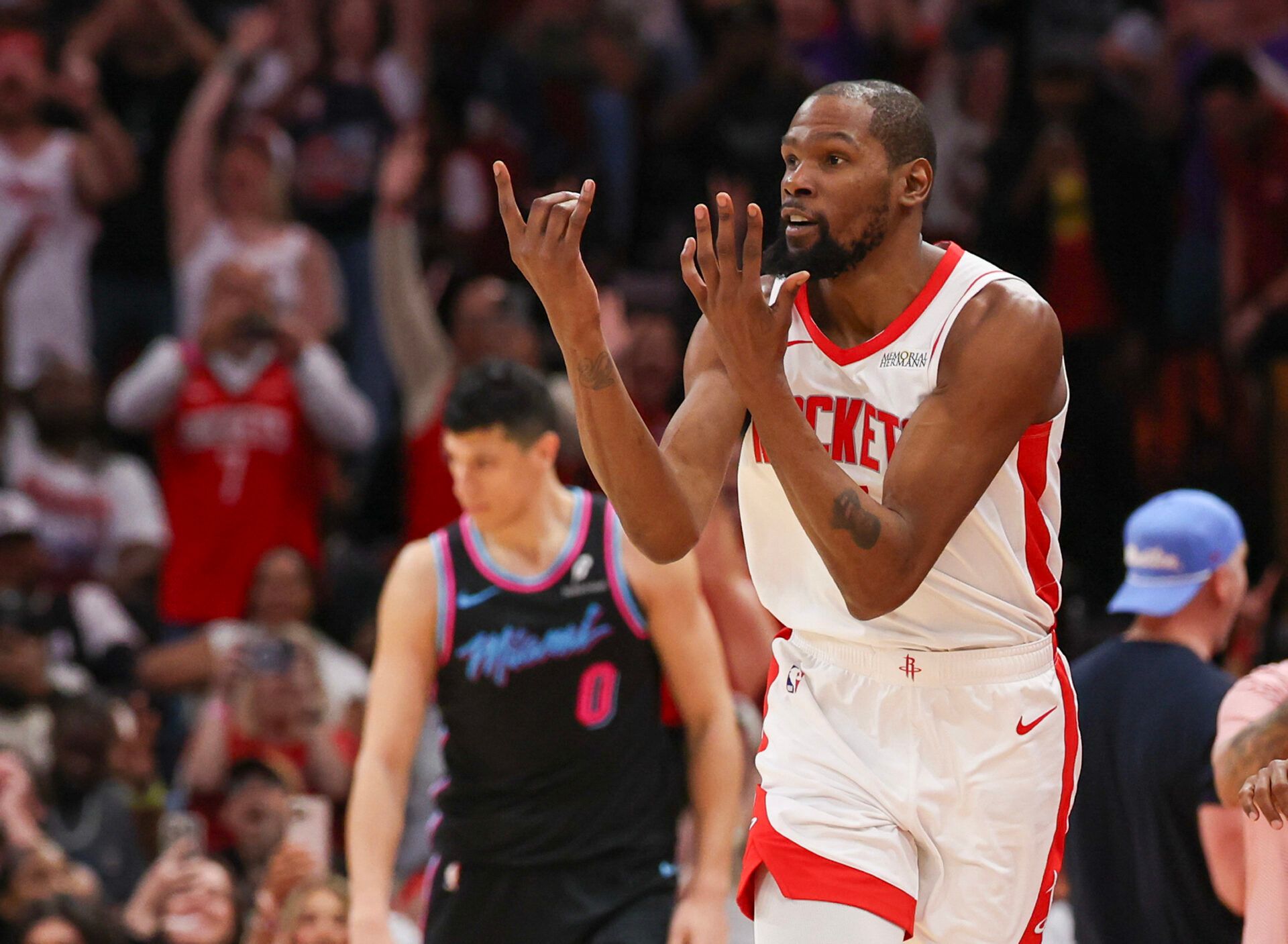 Houston Rockets forward Kevin Durant (7) reacts after making  a three point basket against Miami Heat forward Simone Fontecchio (0)(not pictured)  in the second half at Toyota Center. Durant scored 27 points in the game passing Michael Jordan for fifth all time in points in the NBA.