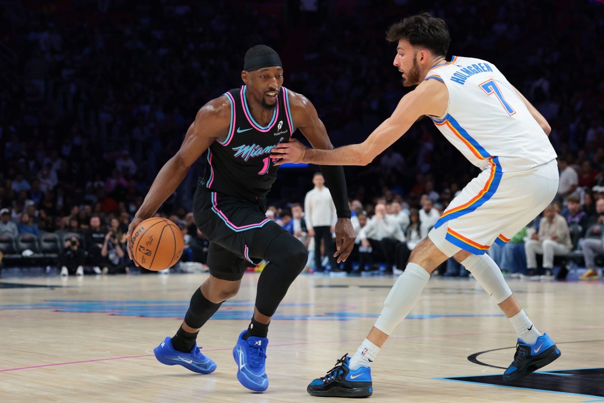 Miami Heat center Bam Adebayo (13) drives to the basket against Oklahoma City Thunder center Chet Holmgren (7) during the third quarter at Kaseya Center.