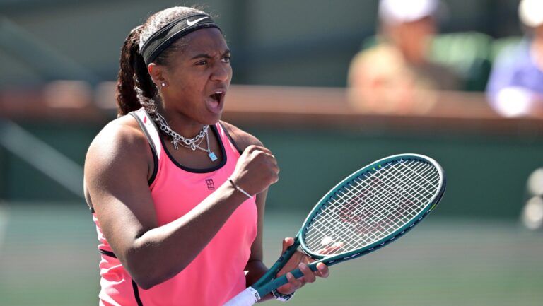 Hailey Baptiste (USA) reacts after winning the second set during her second round match against Elena Rybakina (KAZ) in the BNP Paribas Open at the Indian Wells Tennis Garden.