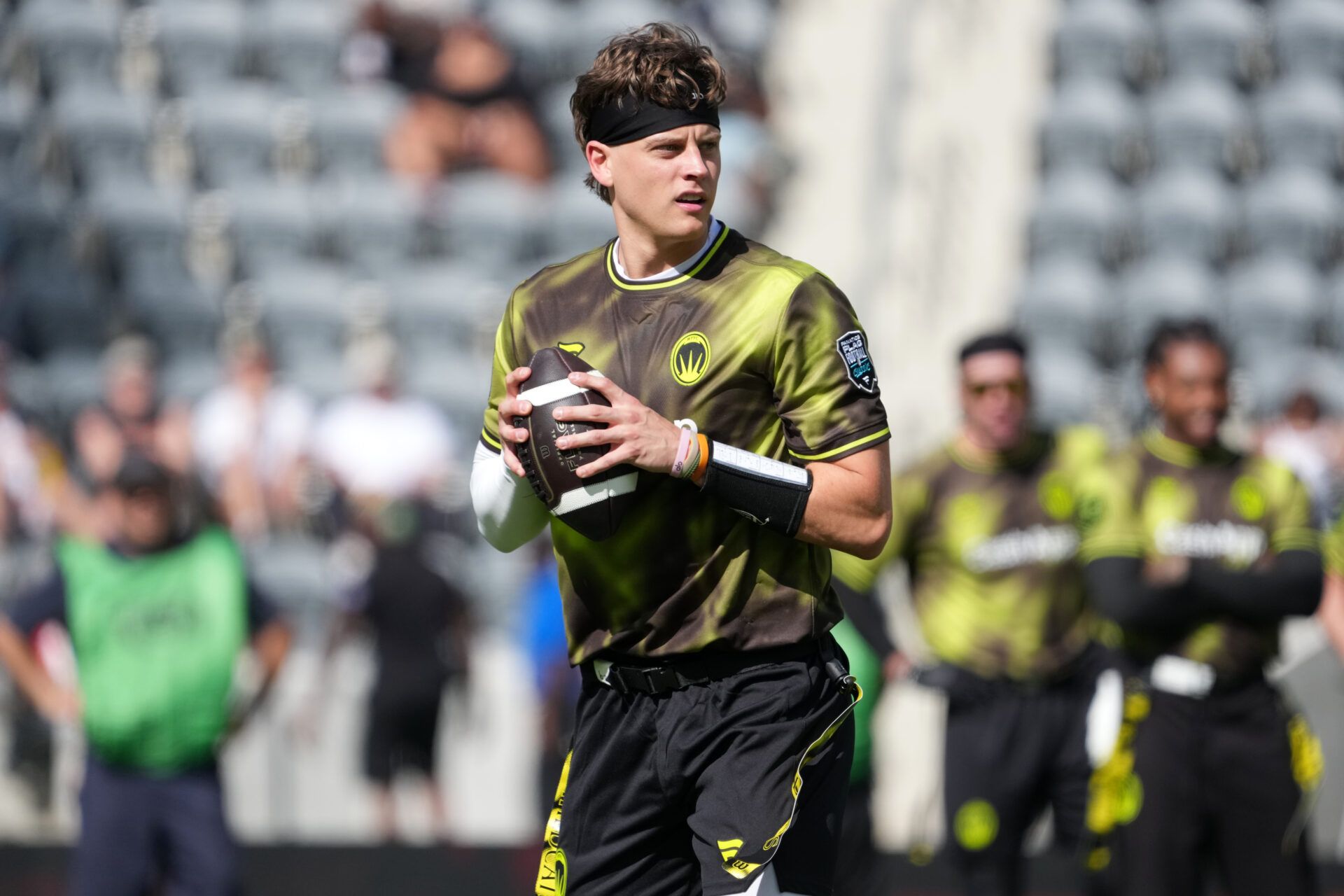 Wildcats FFC quarterback Joe Burrow throws the ball during the Fanatics Flag Football Classic at BMO stadium.