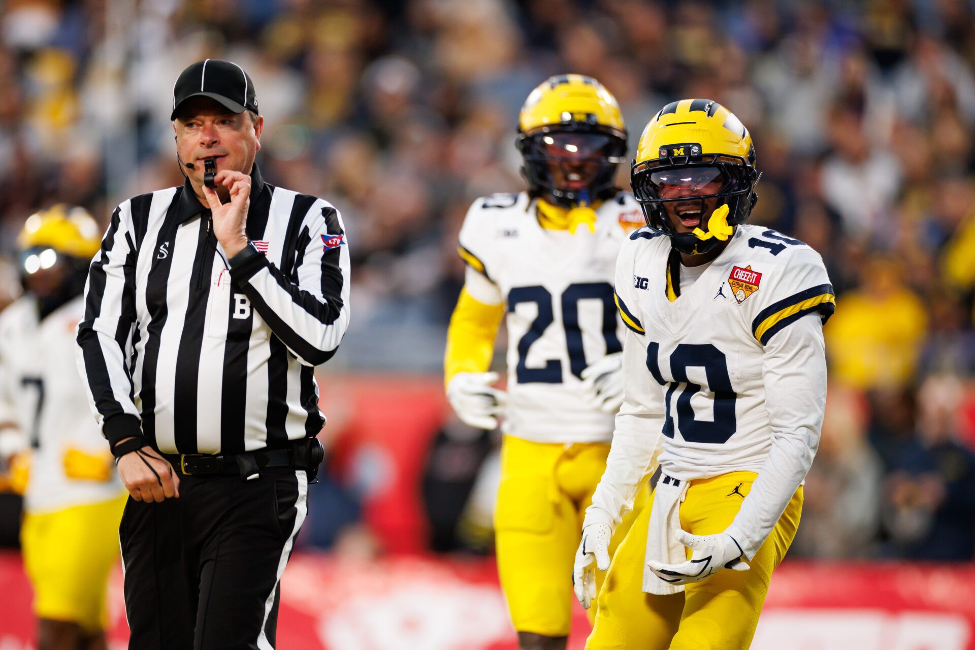 Michigan Wolverines defensive back Zeke Berry (10) argues a call with an official against the Texas Longhorns during the second half at Camping World Stadium.