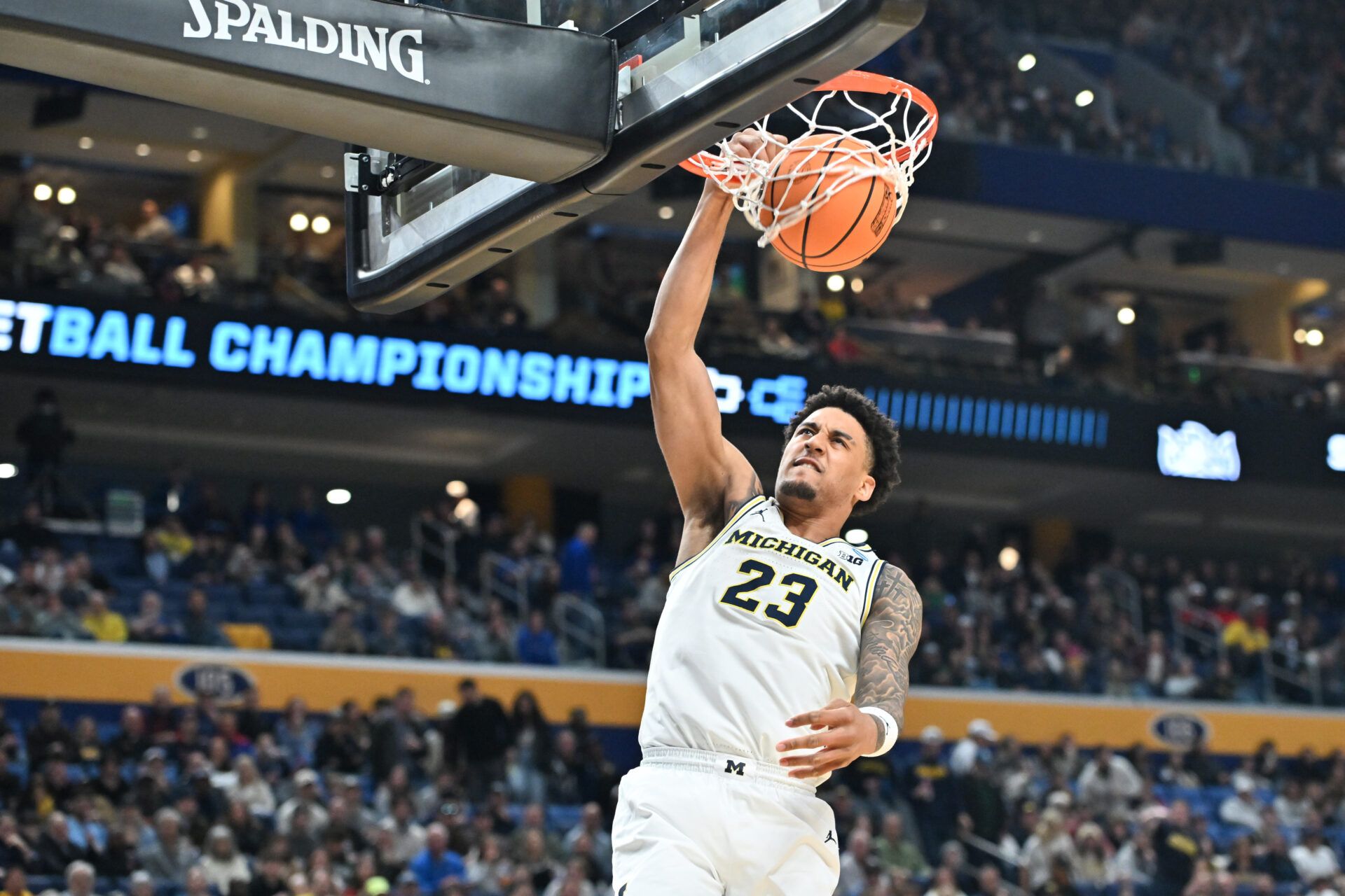 Michigan Wolverines forward Yaxel Lendeborg (23) dunks the ball in the second half against the Saint Louis Billikens during a second round game of the men's 2026 NCAA Tournament at Keybank Center.
