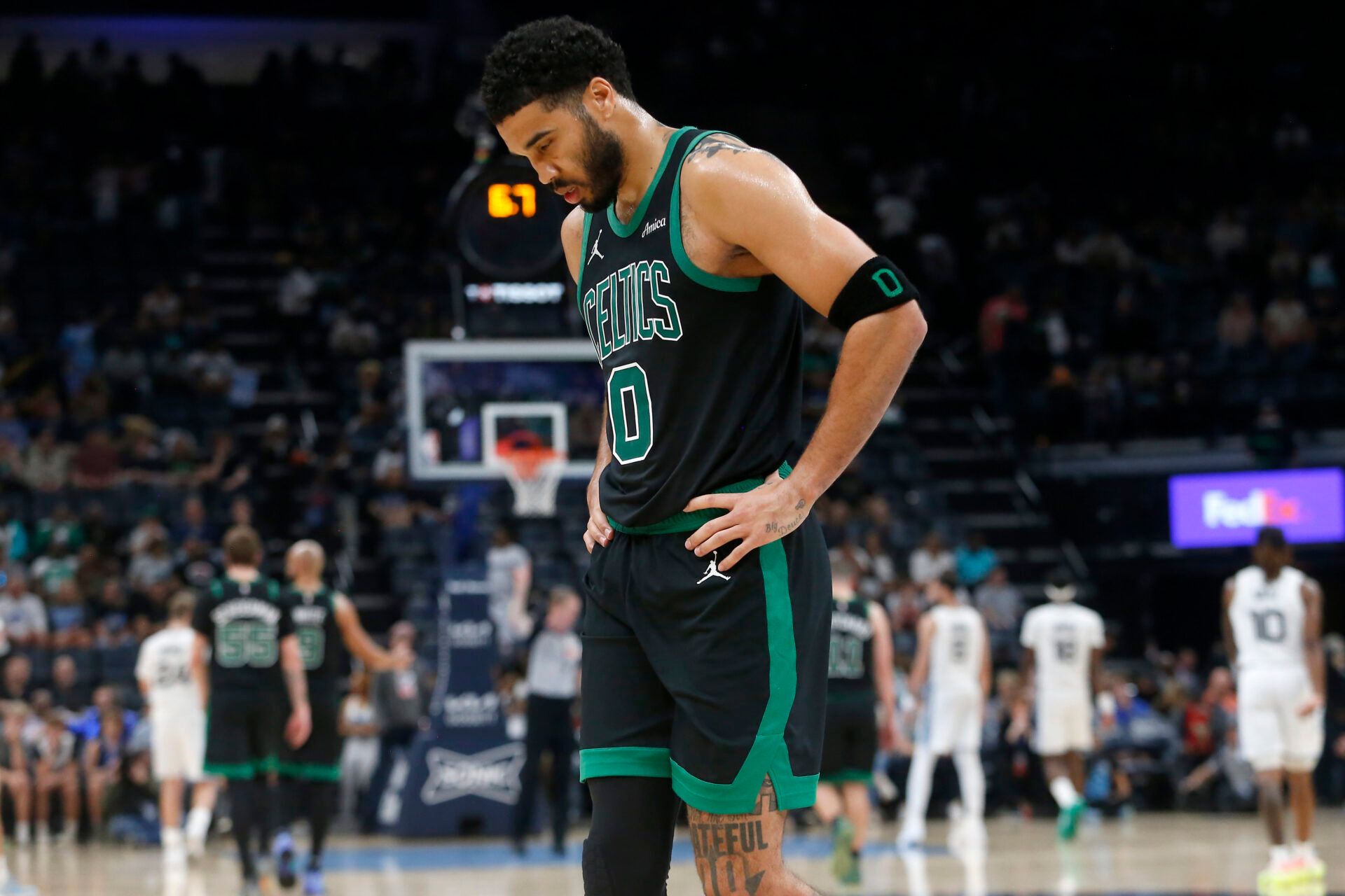 Boston Celtics forward Jayson Tatum (0) walks toward the bench during the fourth quarter against the Memphis Grizzlies at FedExForum.