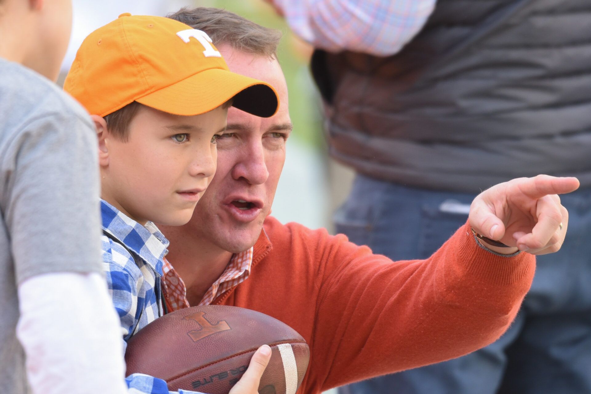 Tennessee Volunteers former quarterback Peyton Manning and his son Marshall before the game against the Alabama Crimson Tide at Neyland Stadium.