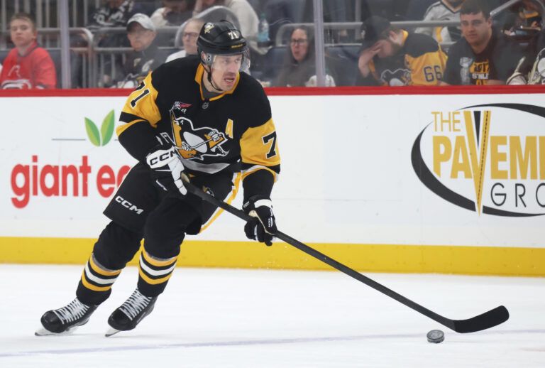 Pittsburgh Penguins center Evgeni Malkin (71) skates up ice with the puck against the Carolina Hurricanes during the first period at PPG Paints Arena.
