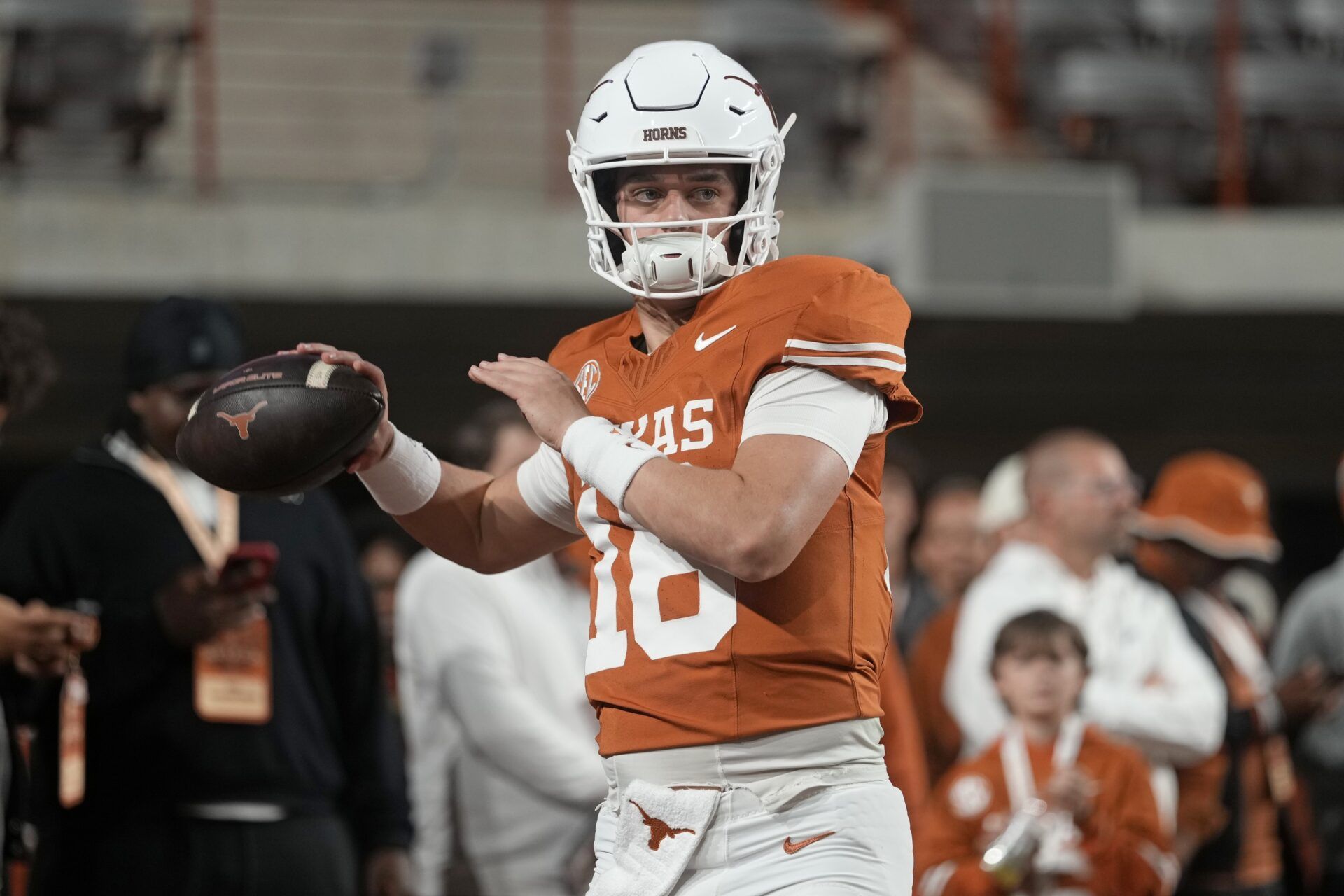 Texas Longhorns quarterback Arch Manning warms up before a game against the Texas A&M Aggies at Darrell K Royal-Texas Memorial Stadium.