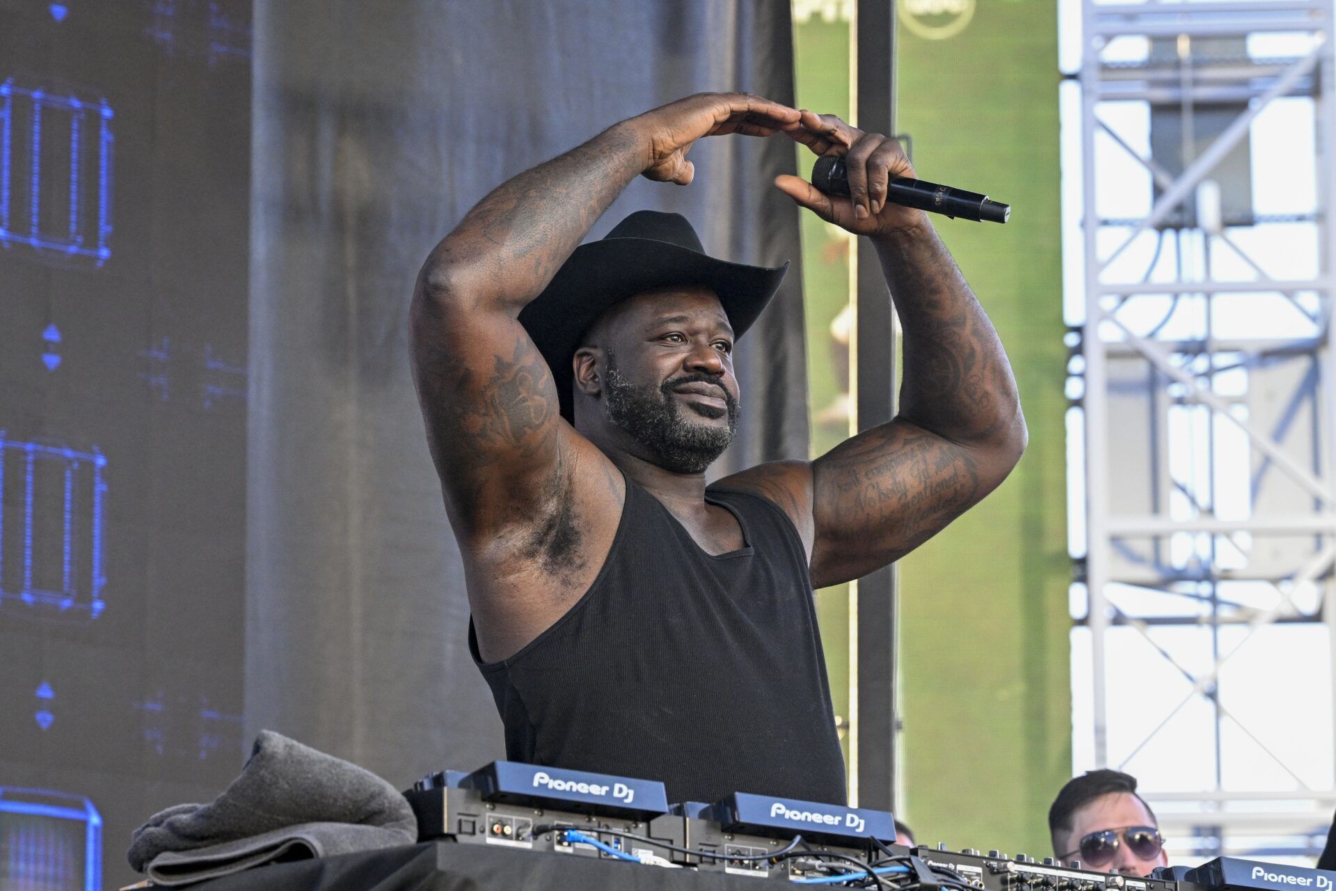 Shaquille O'Neal, also known as DJ Diesel, performs before the 2025 Cotton Bowl and quarterfinal game of the College Football Playoff at AT&T Stadium.