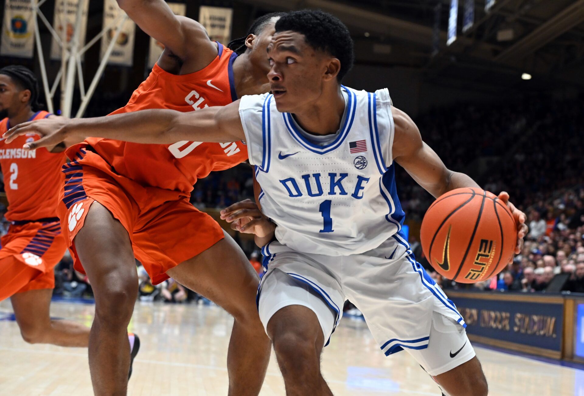 Duke Blue Devils guard Caleb Foster (1) controls the ball in front of Clemson Tigers forward RJ Godfrey (0) during the second half at Cameron Indoor Stadium.