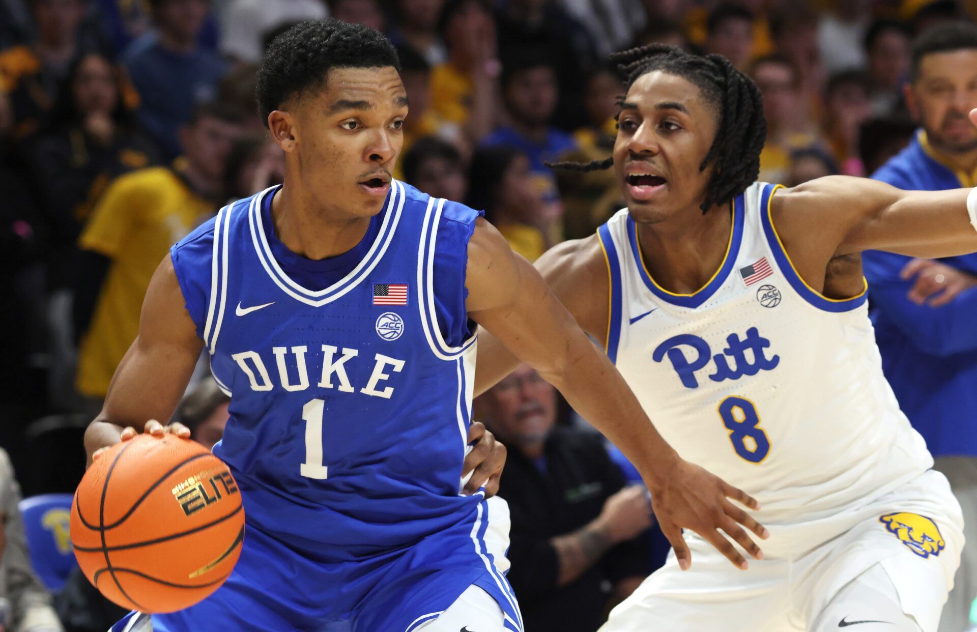 Duke Blue Devils guard Caleb Foster (1) dribbles the ball against Pittsburgh Panthers guard Omari Witherspoon (8) during the first half at Petersen Events Center.
