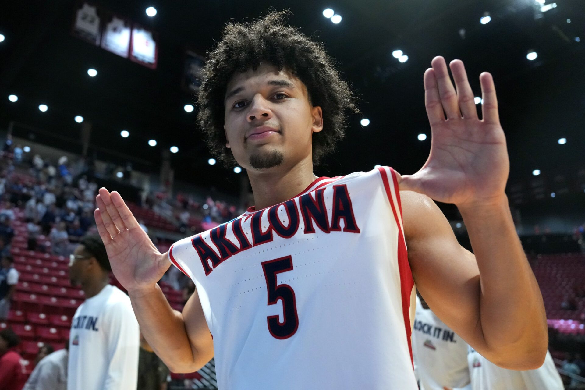 Arizona Wildcats guard Brayden Burries (5) celebrates after defeating the Utah State Aggies during a second round game of the men's 2026 NCAA Tournament at Viejas Arena.
