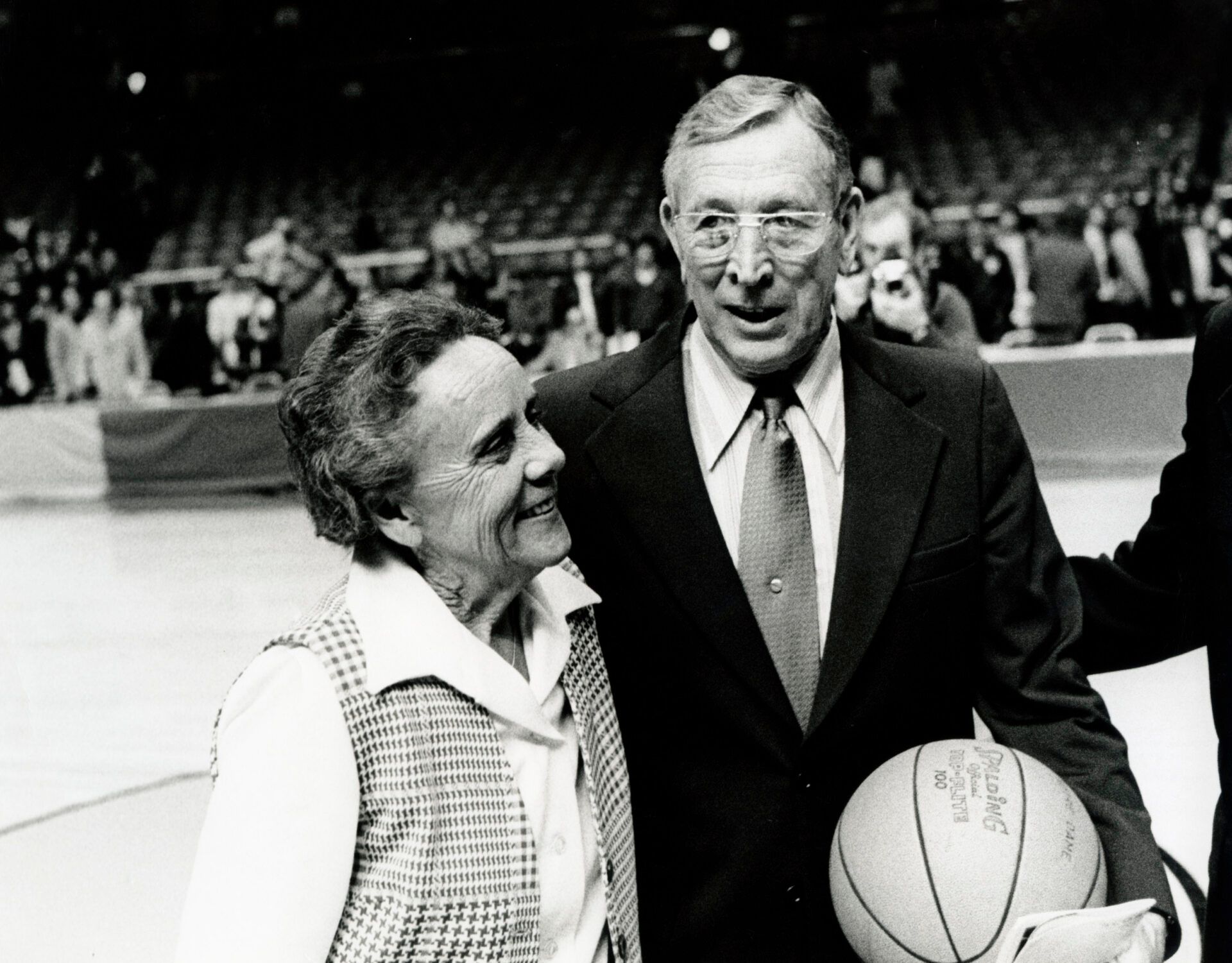 Mar 1973; St. Louis, MO, USA; FILE PHOTO; UCLA Bruins head coach John Wooden reacts with his wife Nellie Wooden after winning the 1973 NCAA basketball championship.