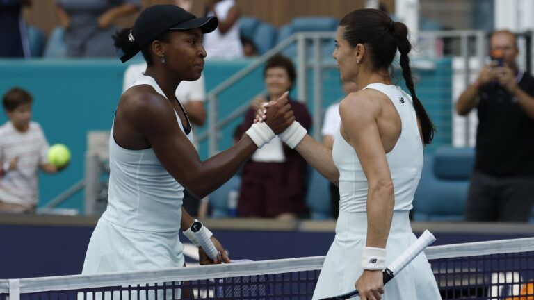 Coco Gauff (USA) (L) shakes hands with Sorana Cirstea (ROU) (R) on day 7 of the 2026 Miami Open at Hard Rock Stadium.