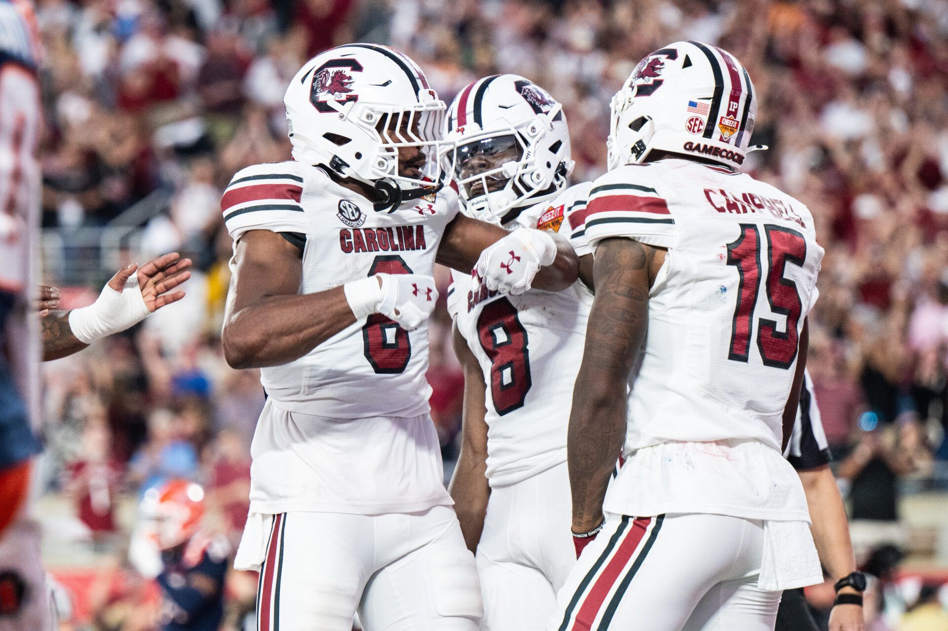 South Carolina Gamecocks running back Dylan Stewart (6) and wide receiver Dalevon Campbell (15)celebrates his touchdown against the Illinois Fighting Illini in the fourth quarter at Camping World Stadium.