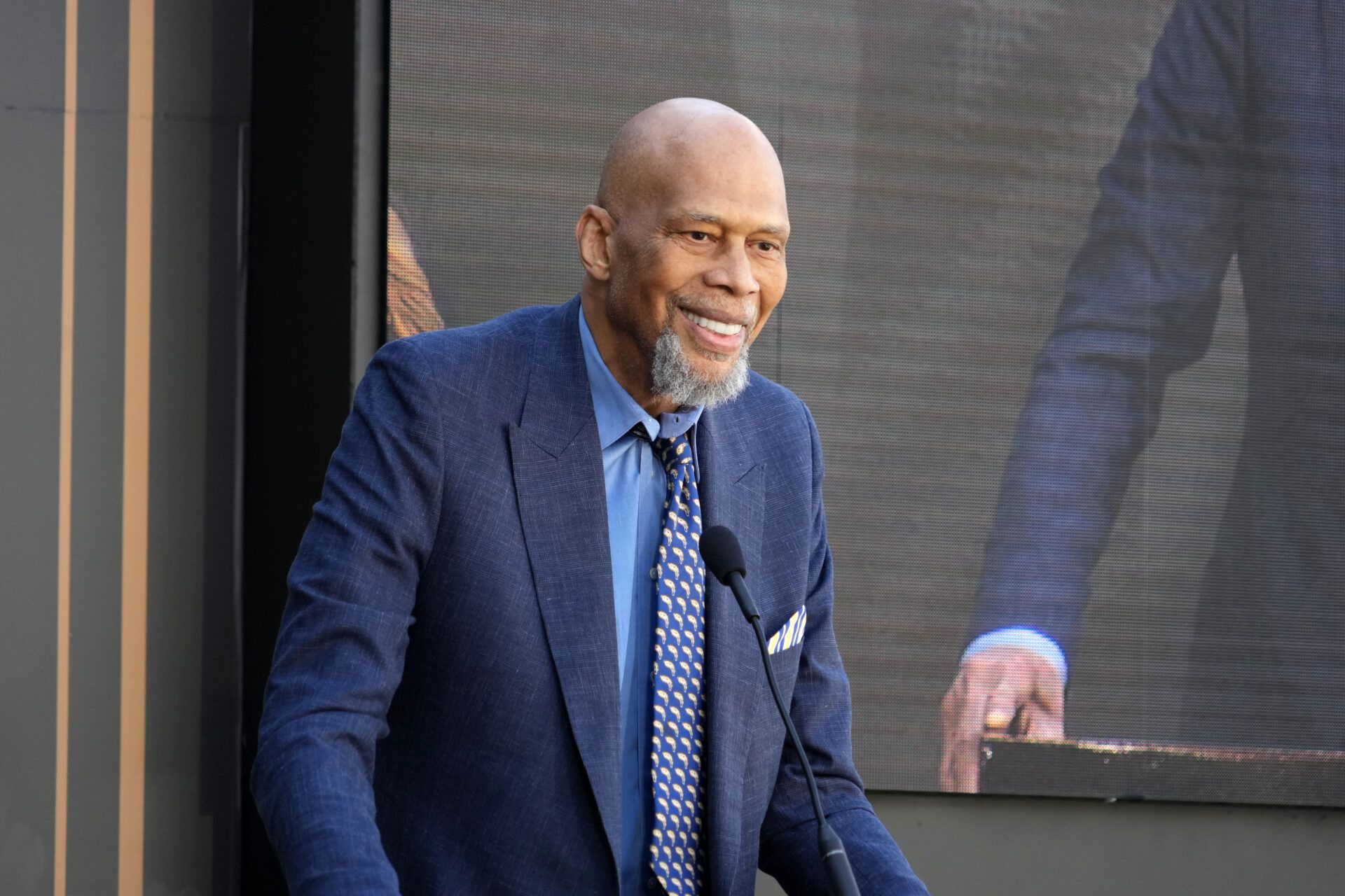 Kareem Abdul-Jabbar speaks at unveiling of statue of former Los Angeles Lakers coach Pat Riley at the Crypto.com Arena.