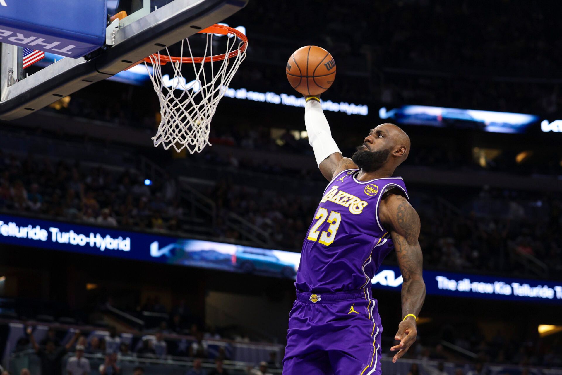 Los Angeles Lakers forward LeBron James (23) drives to the basket against the Orlando Magic in the first quarter at Kia Center.