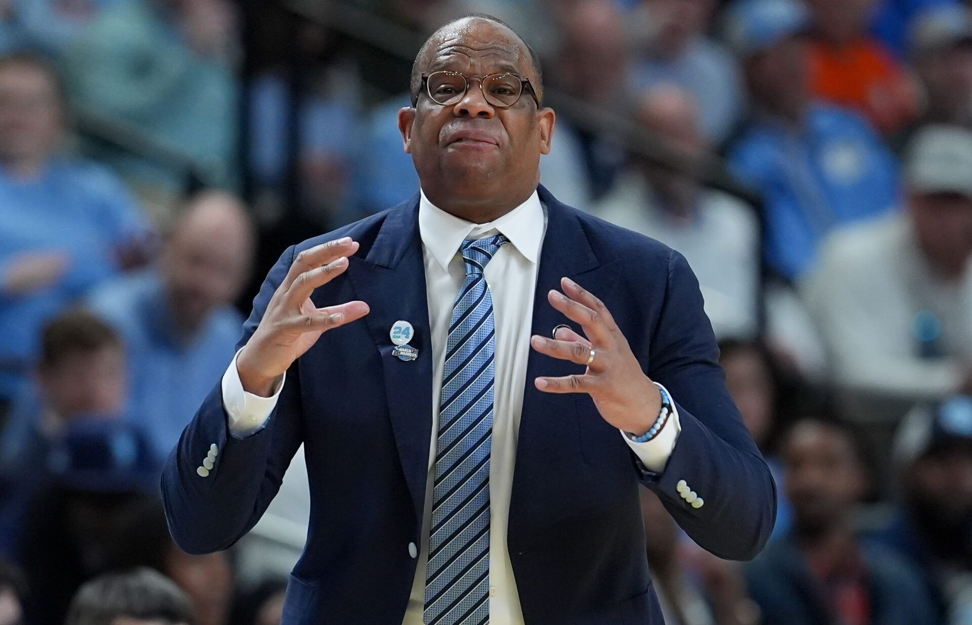 North Carolina Tar Heels head coach Hubert Davis instructs his team against the VCU Rams in the first half of a first round game of the men's 2026 NCAA Tournament at Bon Secours Wellness Arena.