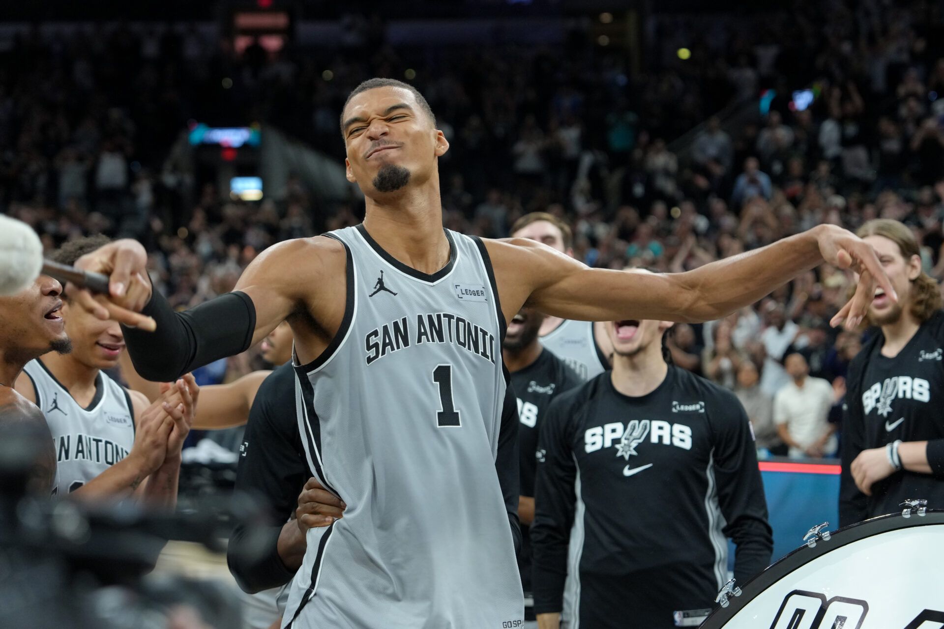 San Antonio Spurs forward Victor Wembanyama (1) celebrates after the game against the Phoenix Suns at Frost Bank Center.
