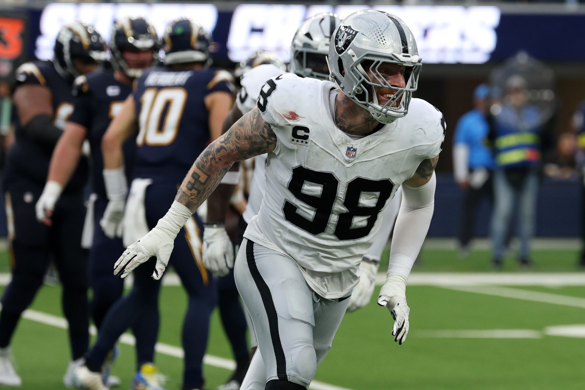 Las Vegas Raiders defensive end Maxx Crosby (98) reacts after a tackle against the Los Angeles Chargers during the second half at SoFi Stadium.